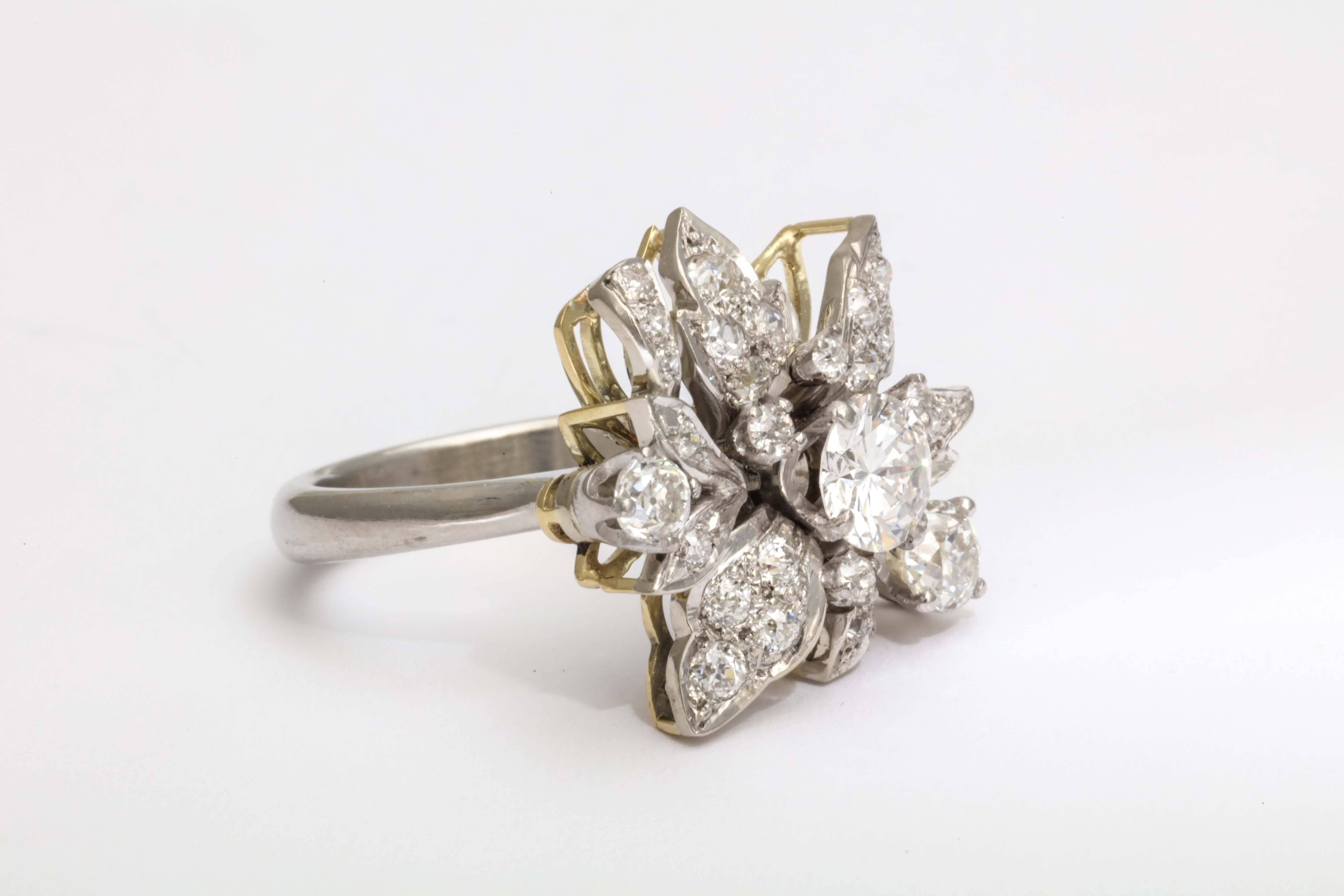 Diamond and Platinum Flower Ring In Excellent Condition For Sale In New York, NY