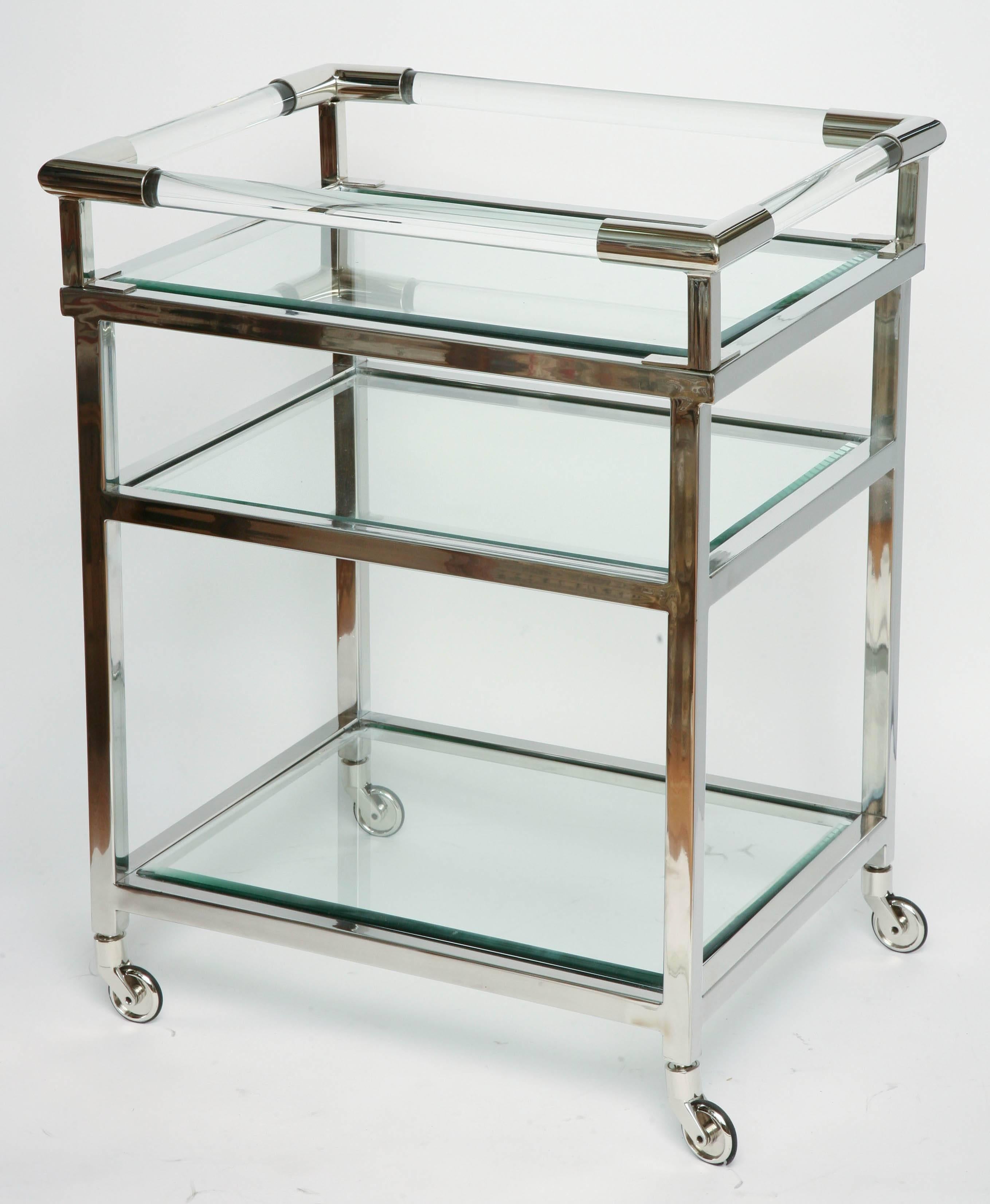 Striking and very unique glass, chrome and Lucite cocktail cart.