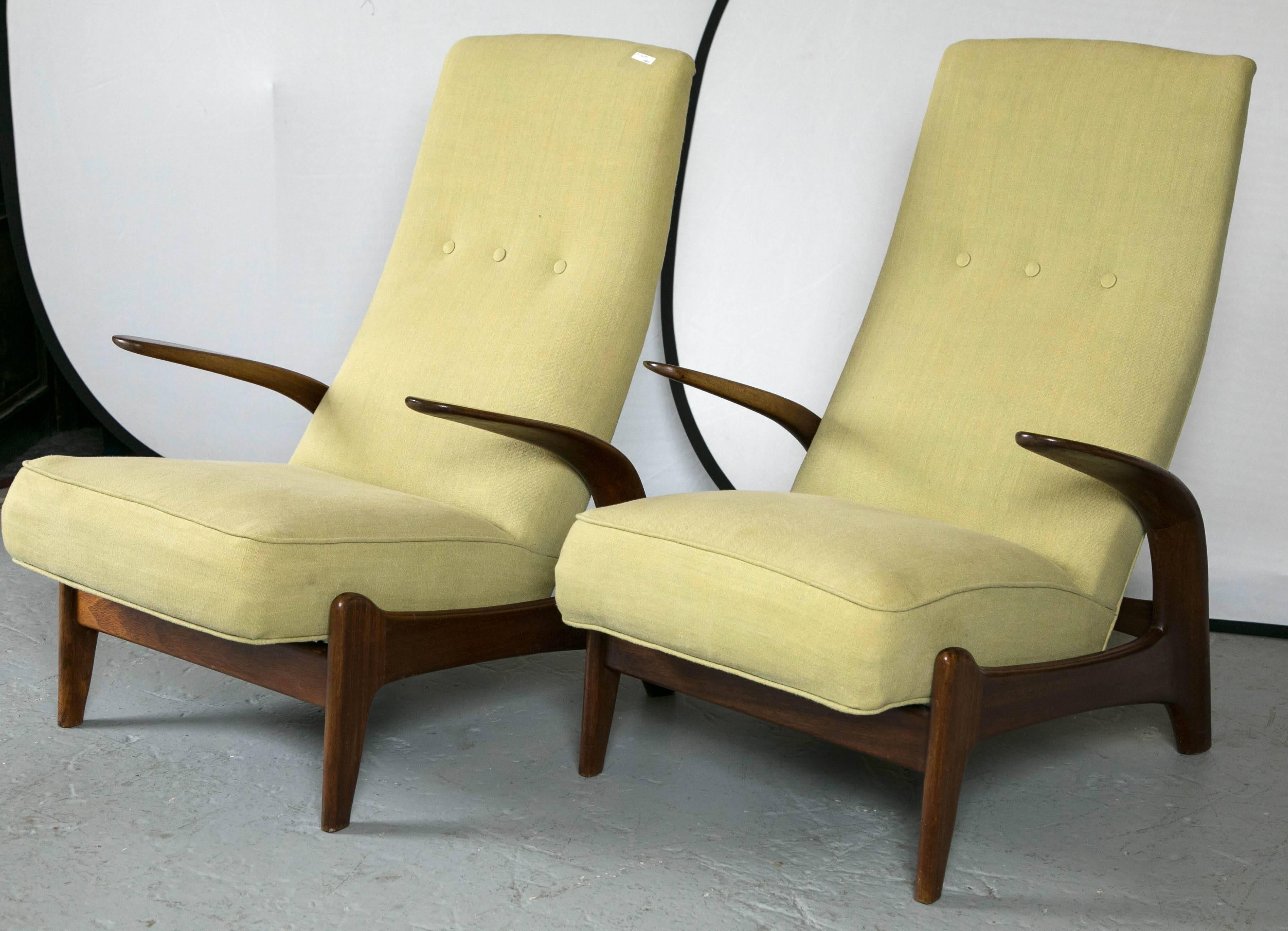 Pair of great Gimson & Slater “Rock n Rest” chairs. Each in a brand new olive green tufted back. The sleek flowing arms and legs support this wonderful tilting mechanism. The rosewood frames polished to a nice sheen with a fine hand rubbed French