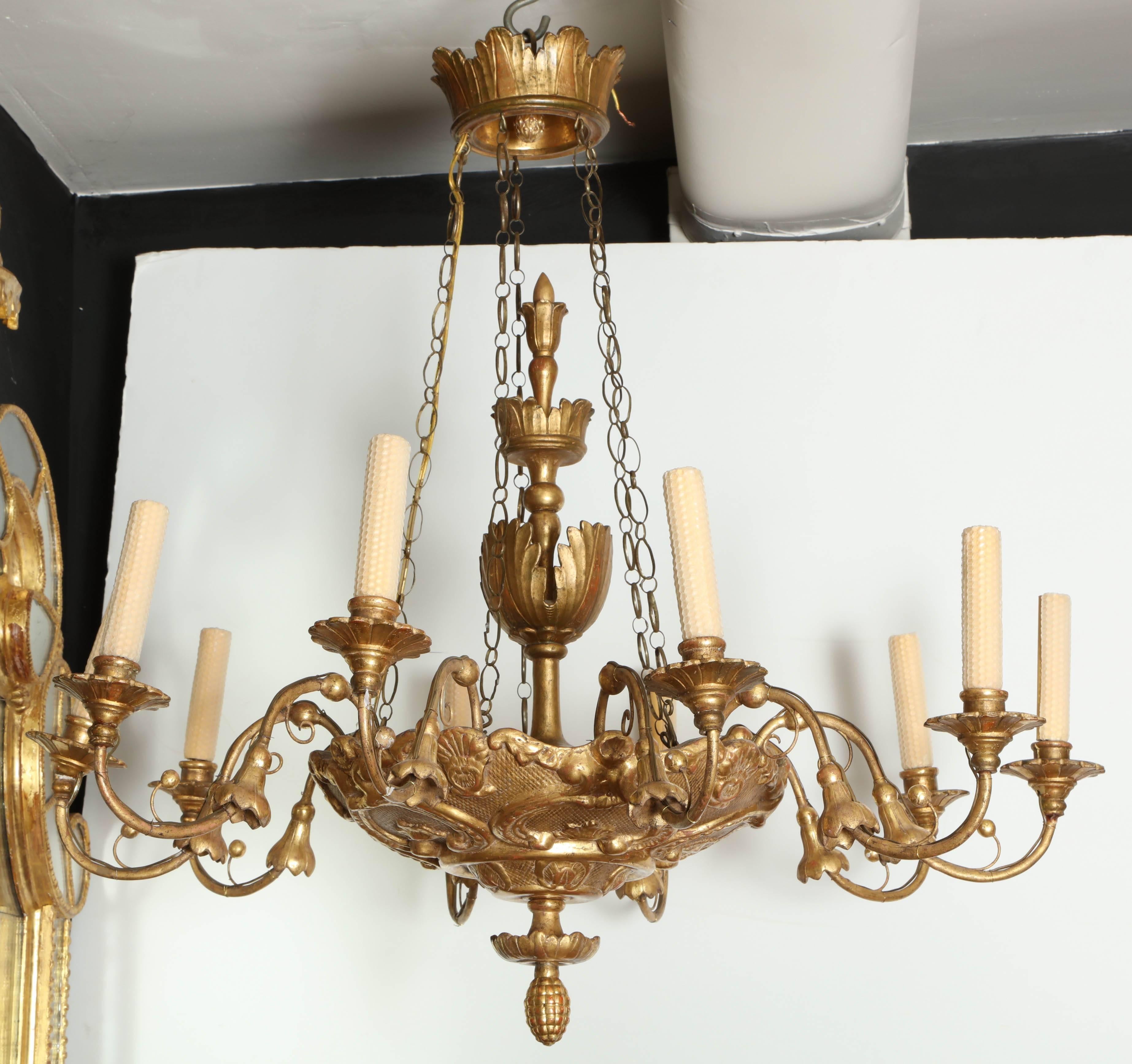 An Italian carved and guilded ten-light chandelier with crown.