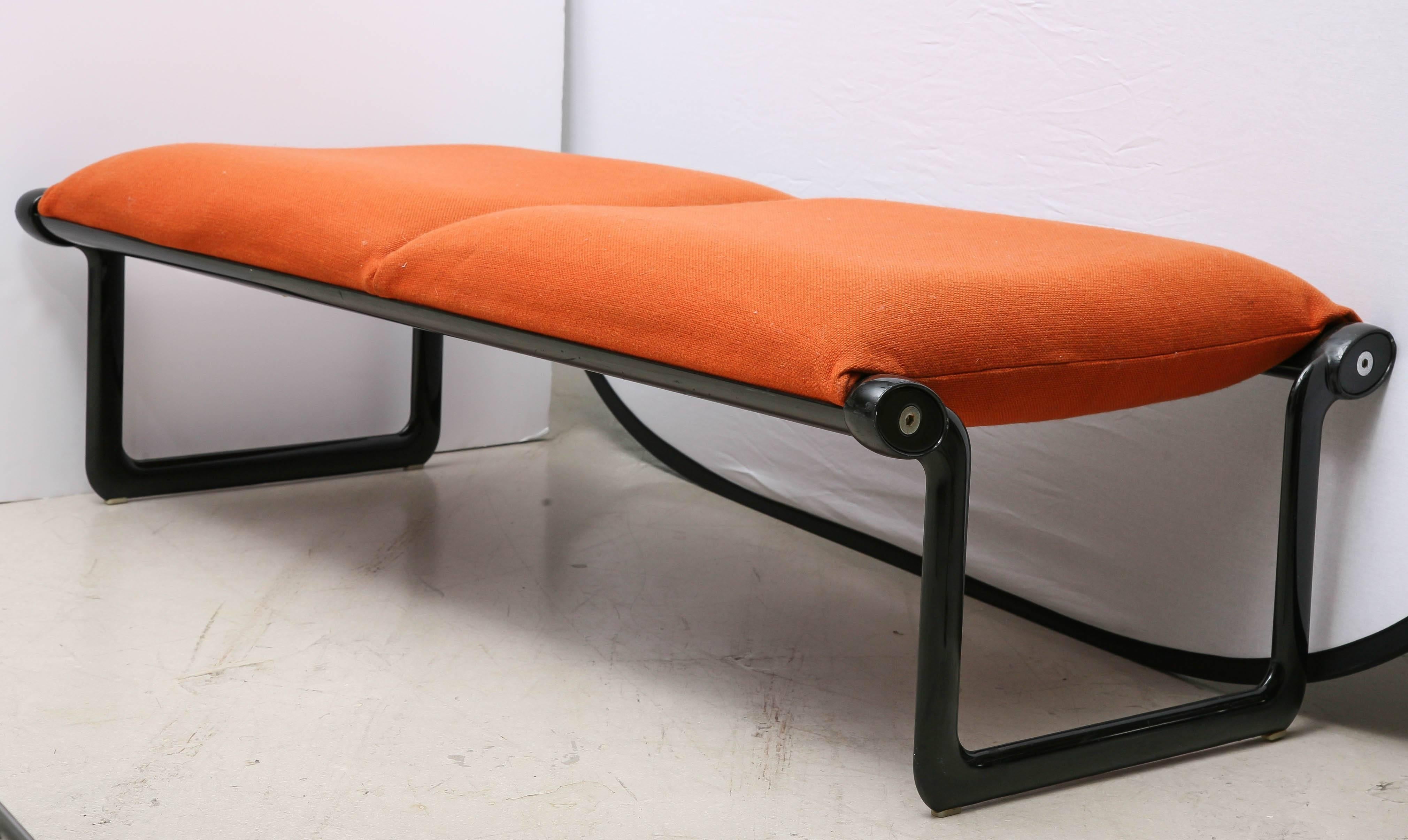Knoll two-seat bench with orange fabric.