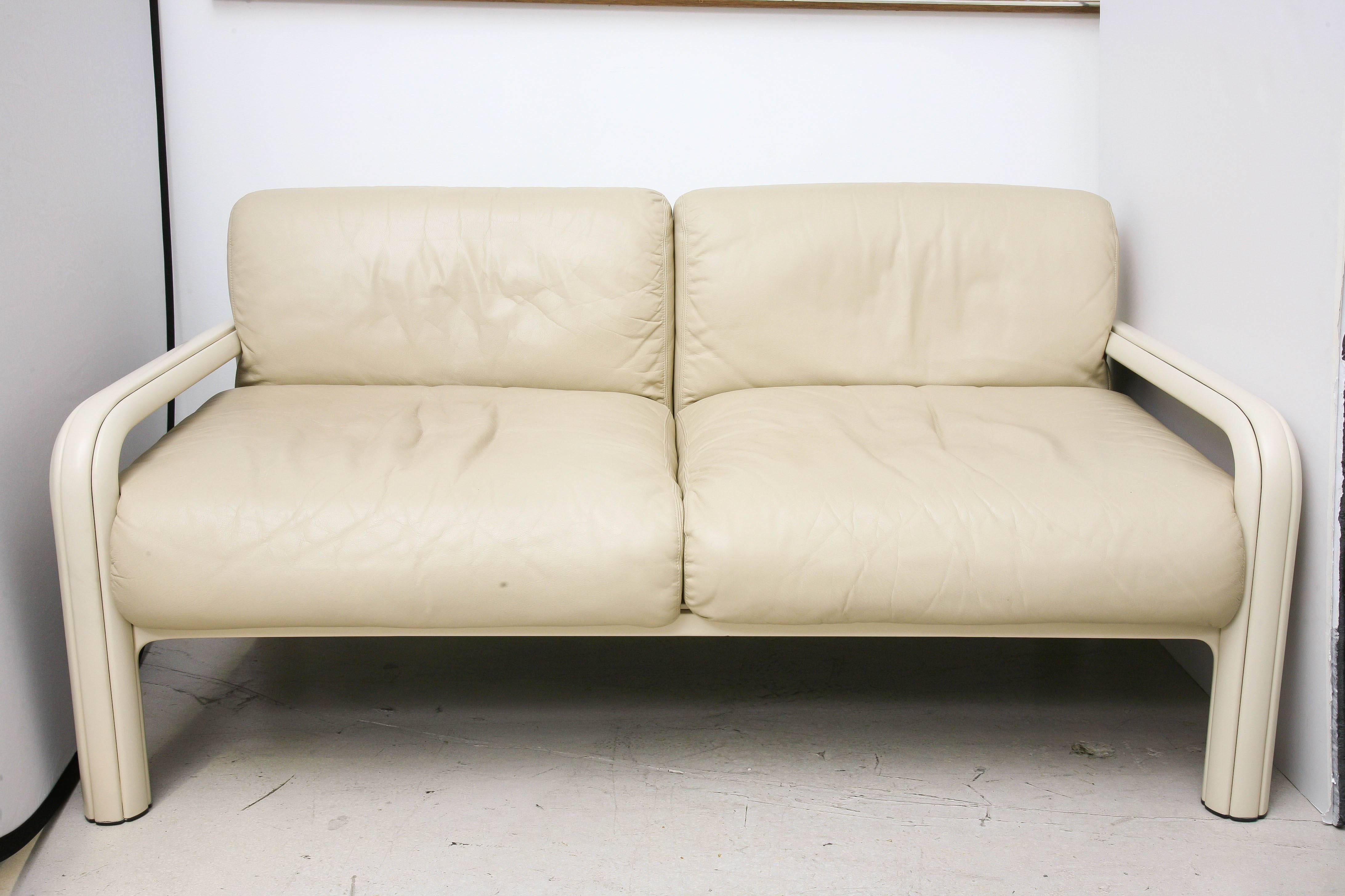 Vintage pair of Gae Aulenti for Knoll settees with taupe colored leather.
