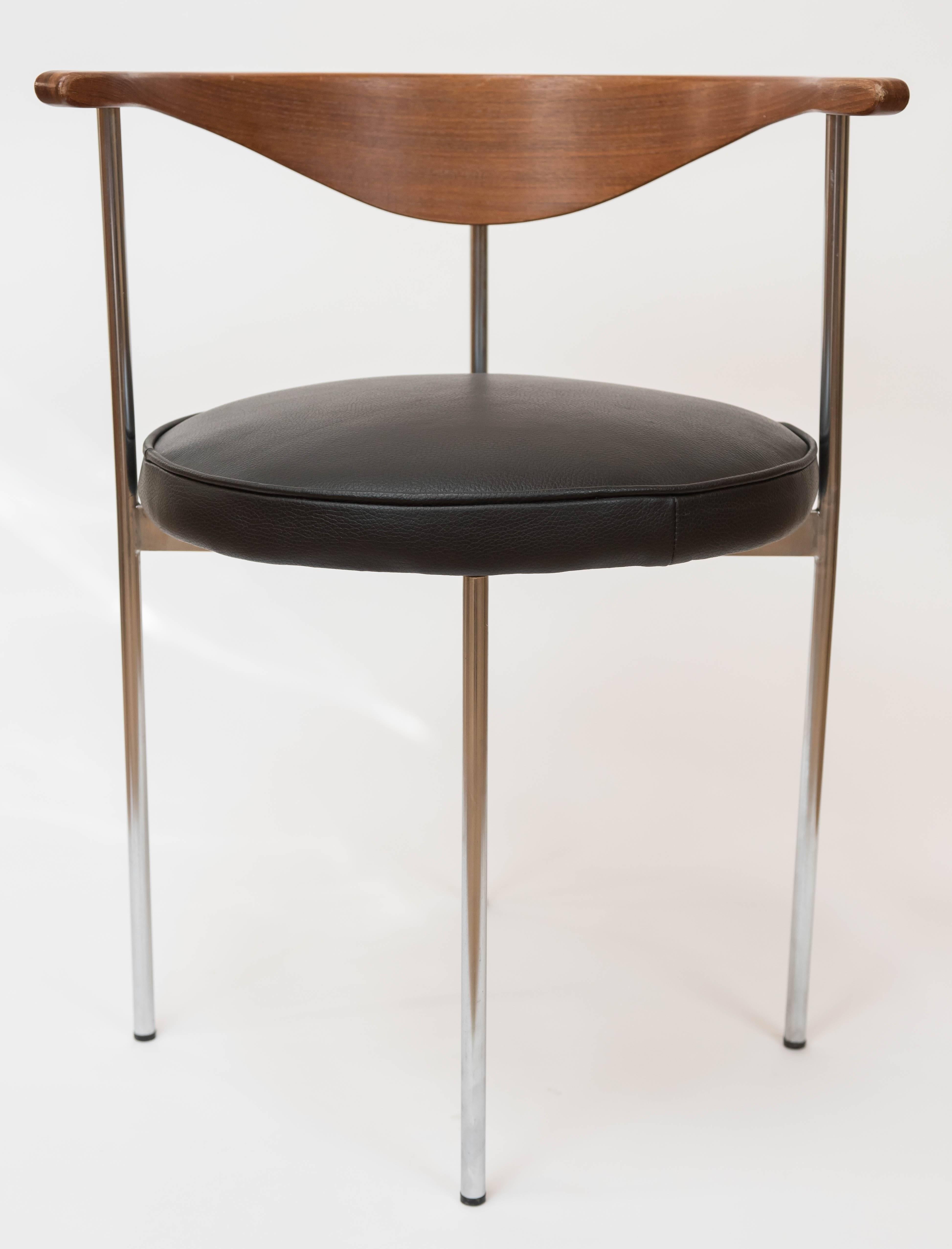 An awesome tubular brushed steel and teak 