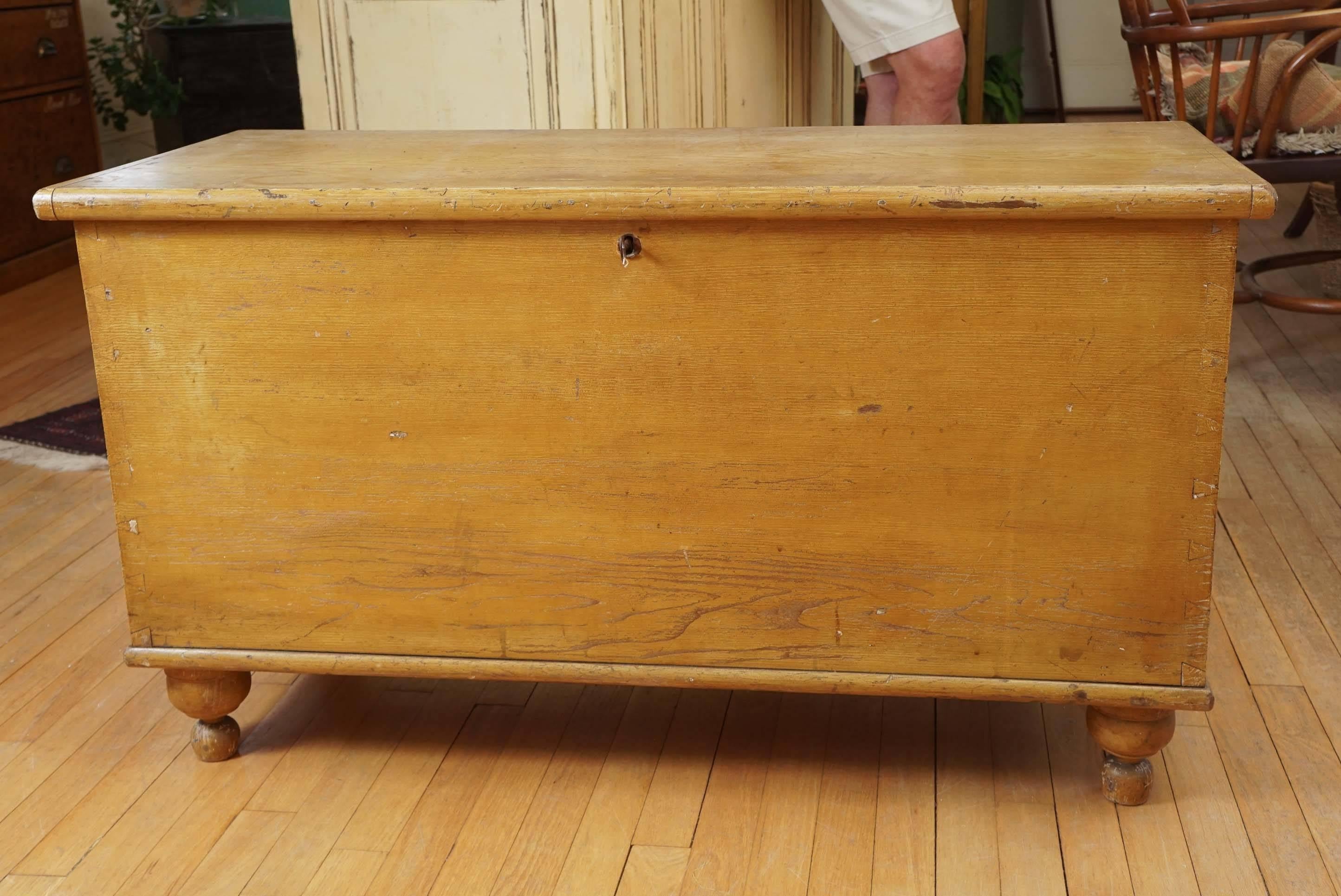 While we like blanket chests for coffee tables we love blanket chests that would look great at the foot of a bed and this one is large enough to qualify. Totally original with great feet, original hinges and a candle box inside there is plenty of