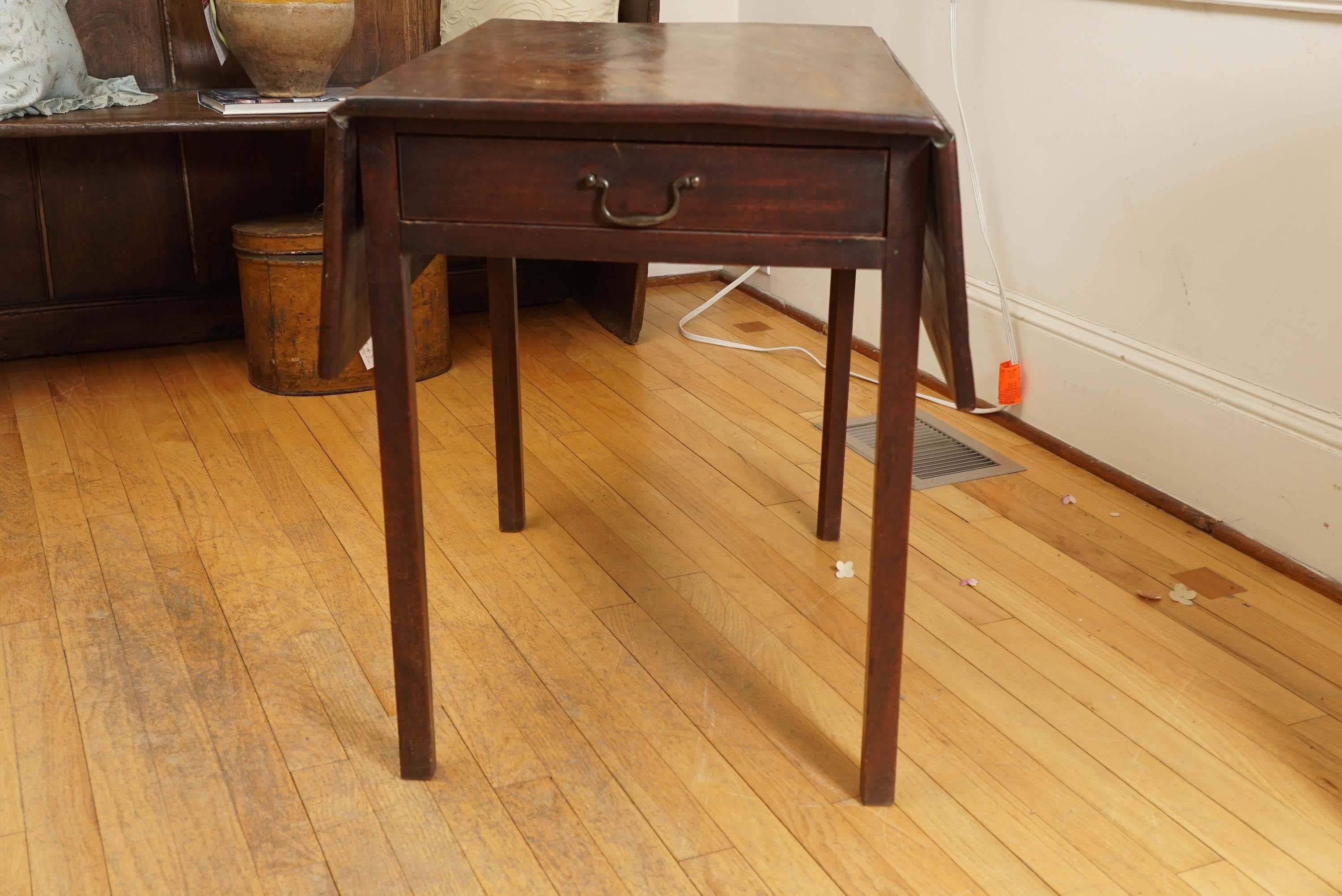 Its all about the wood! The richness of mahogany will not get lost here. This very old piece has one end drawer with original brass handle and would be a stunning end or side table in any room in the house. It works beautifully and has no flaws.