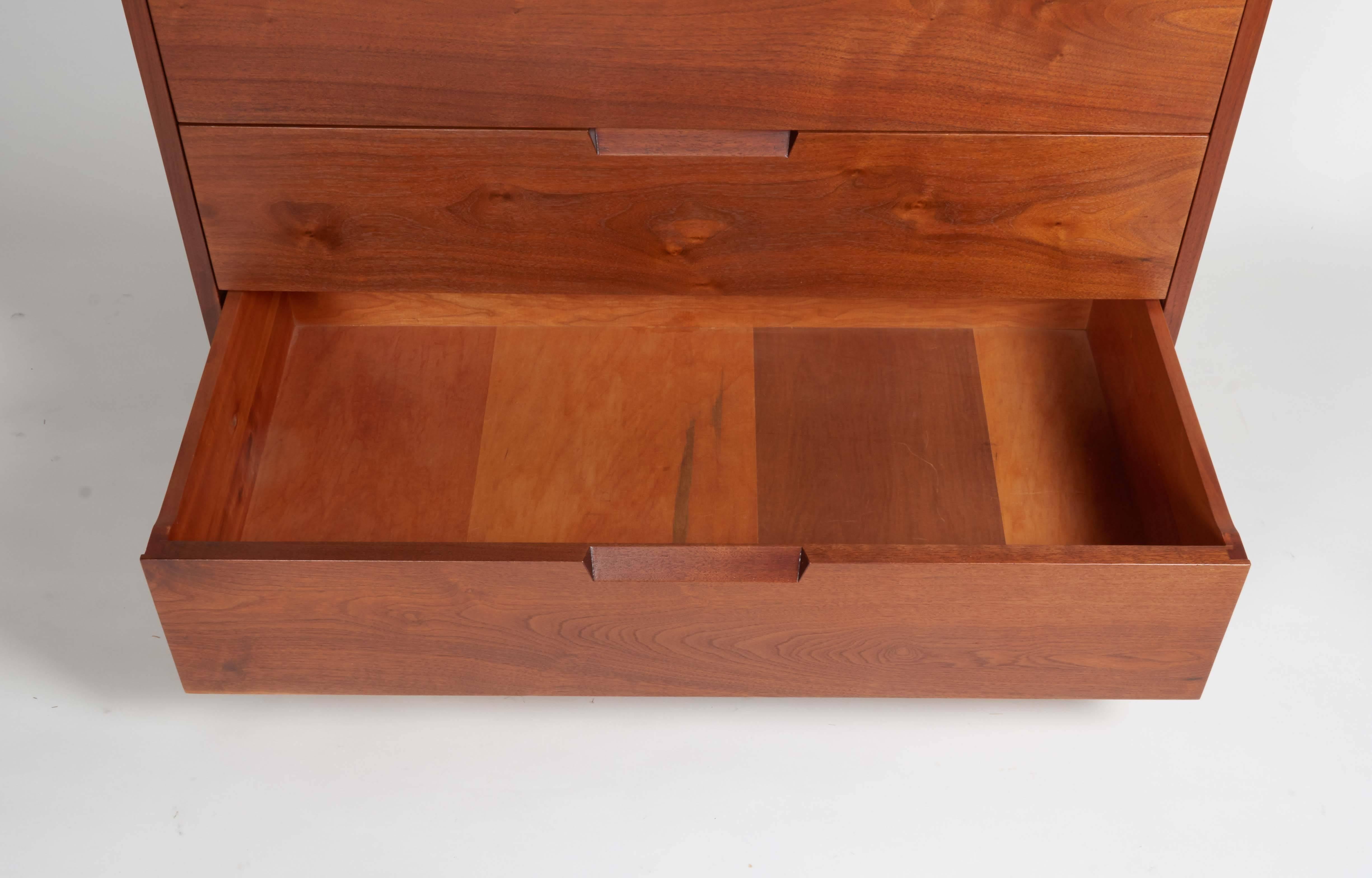 As with all of Nakashima's work the simple beauty of fine craftsmanship and superior quality woods make this an outstanding piece of furniture.