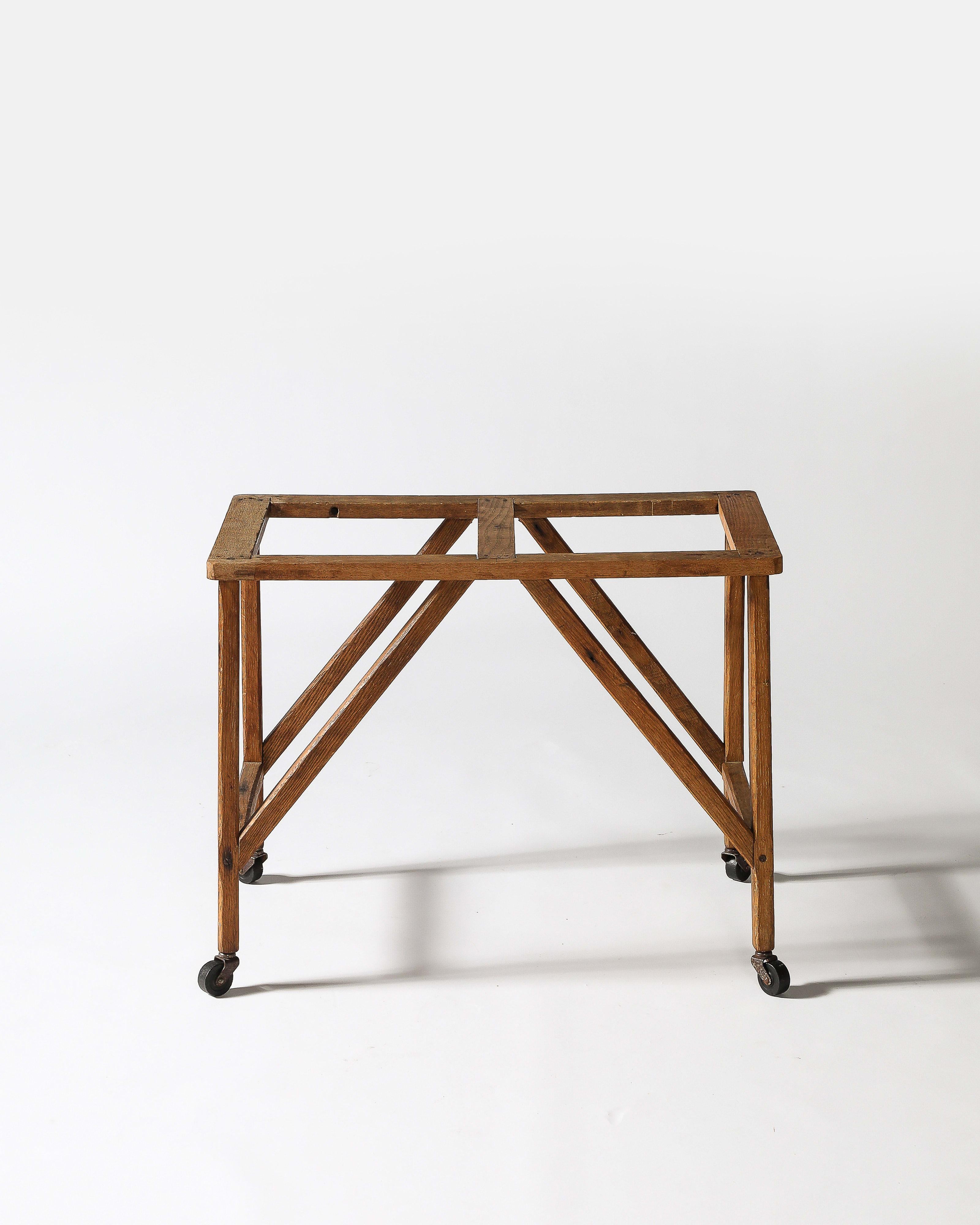 Rustic Oak Table Base with Casters, United States, c. 1950 For Sale