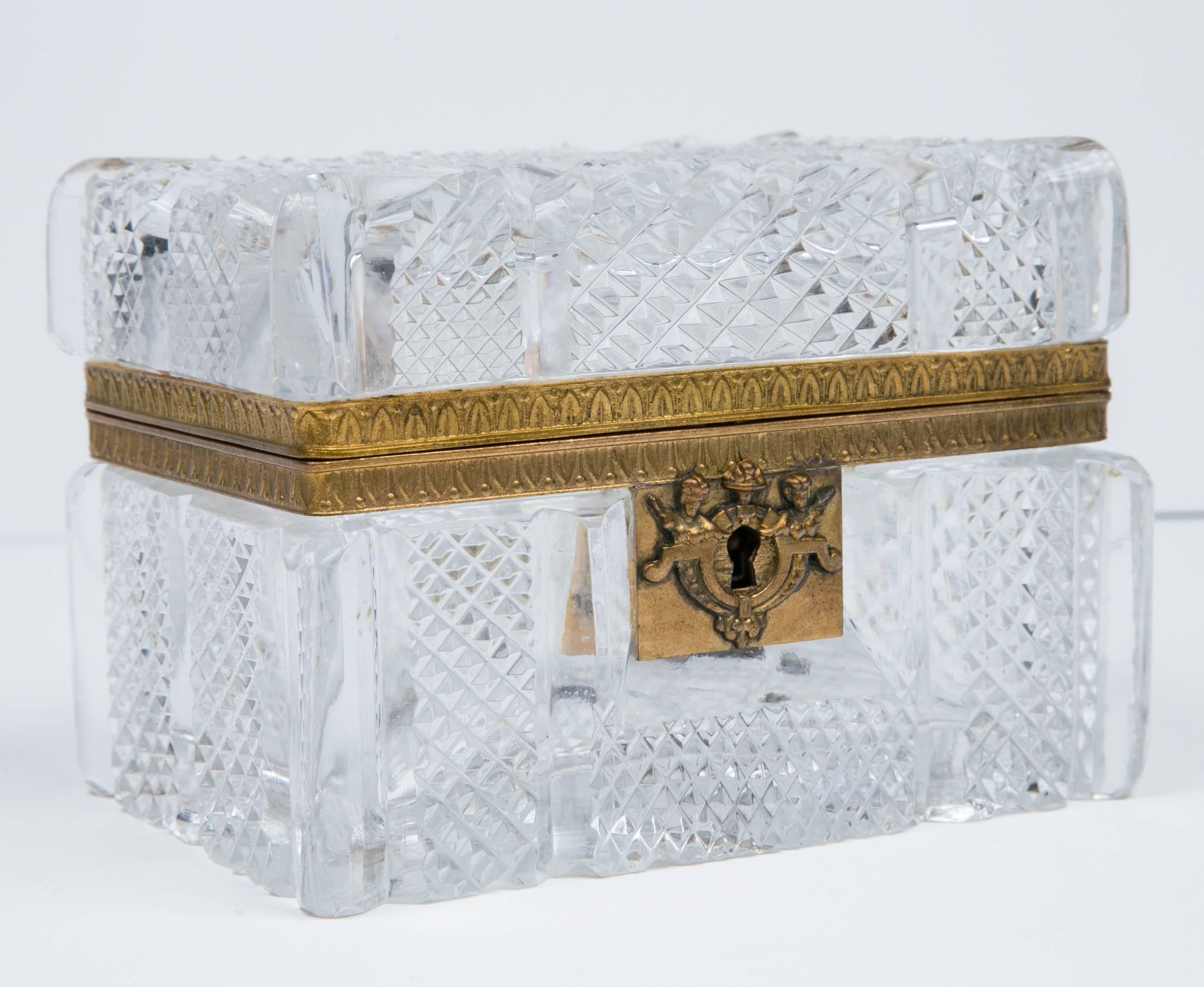 Antique French cut crystal and bronze box in pristine condition. Ornate cut crystal complements the bronze detailing and key hole.
