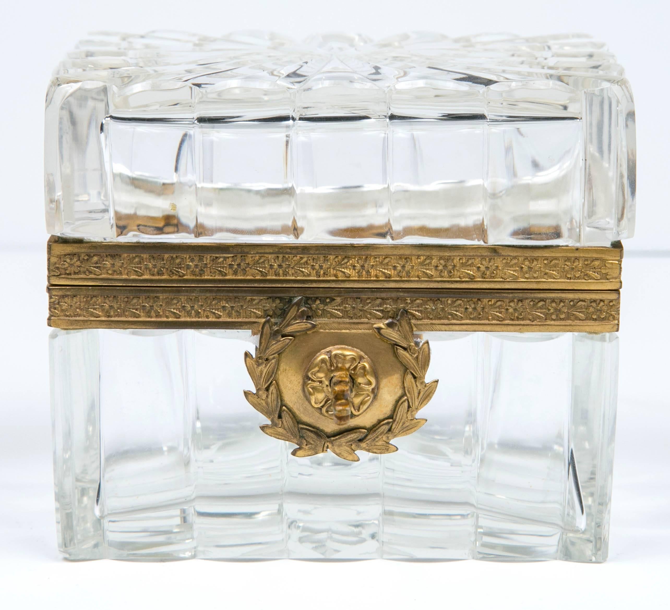 French cut crystal box with bronze detail. Box includes key and is in good condition.