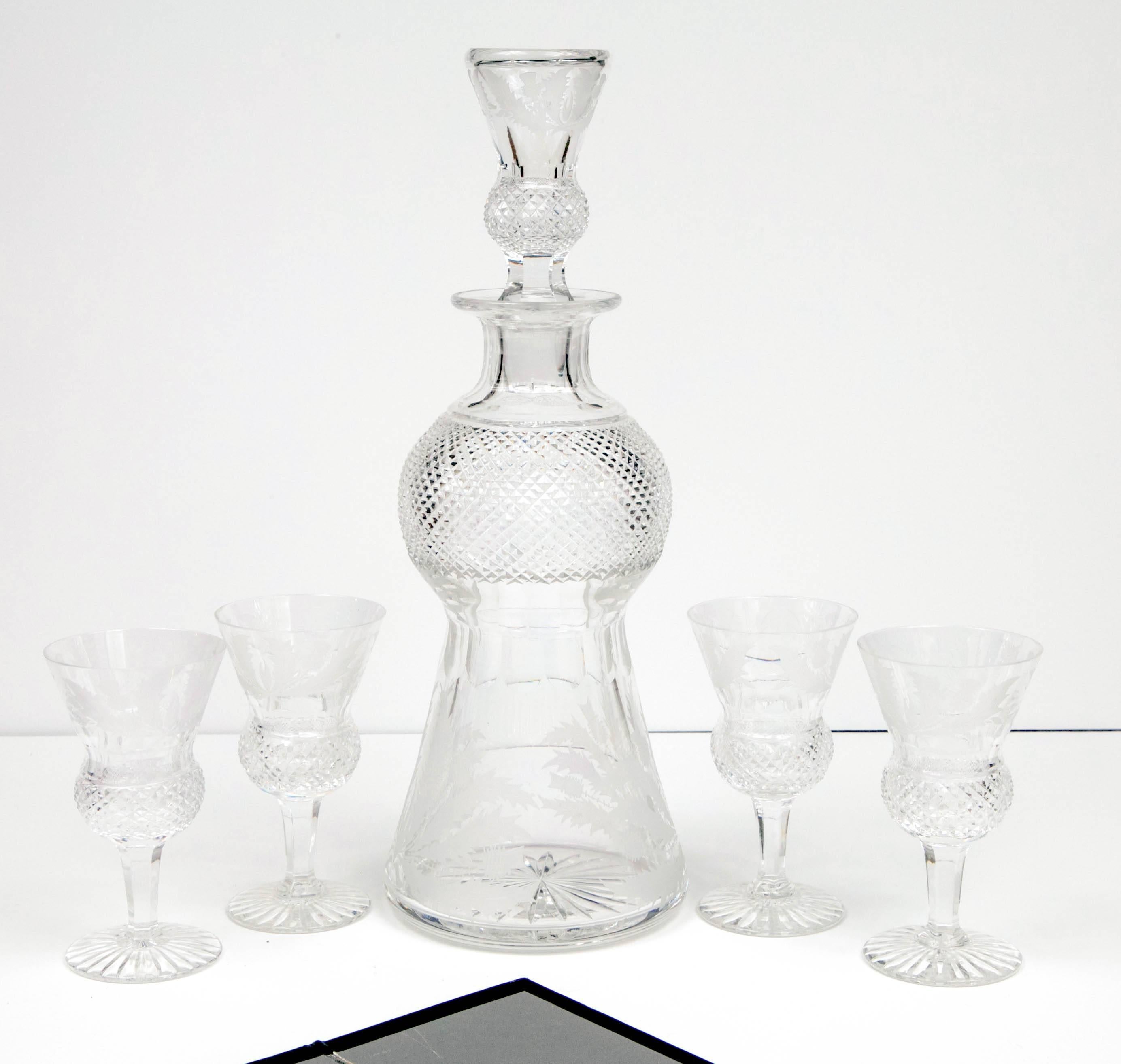 Thistle pattern decanter and stemware from Edinburgh crystal. Pattern features crosshatch, thistle flower and cut crystal. A discontinued pattern.