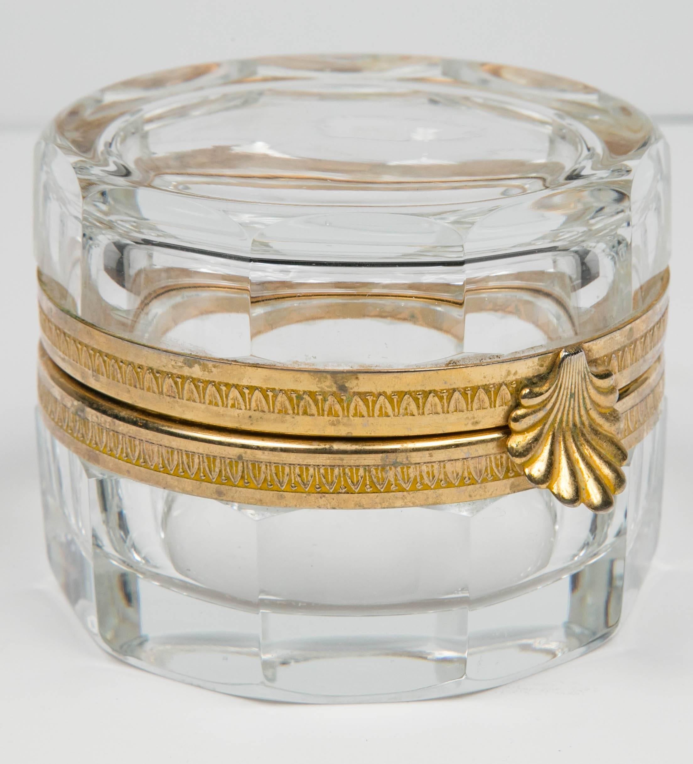 Vintage cut crystal jar box with shell closure and brass detailing at opening. Piece is signed by Martin Benito.