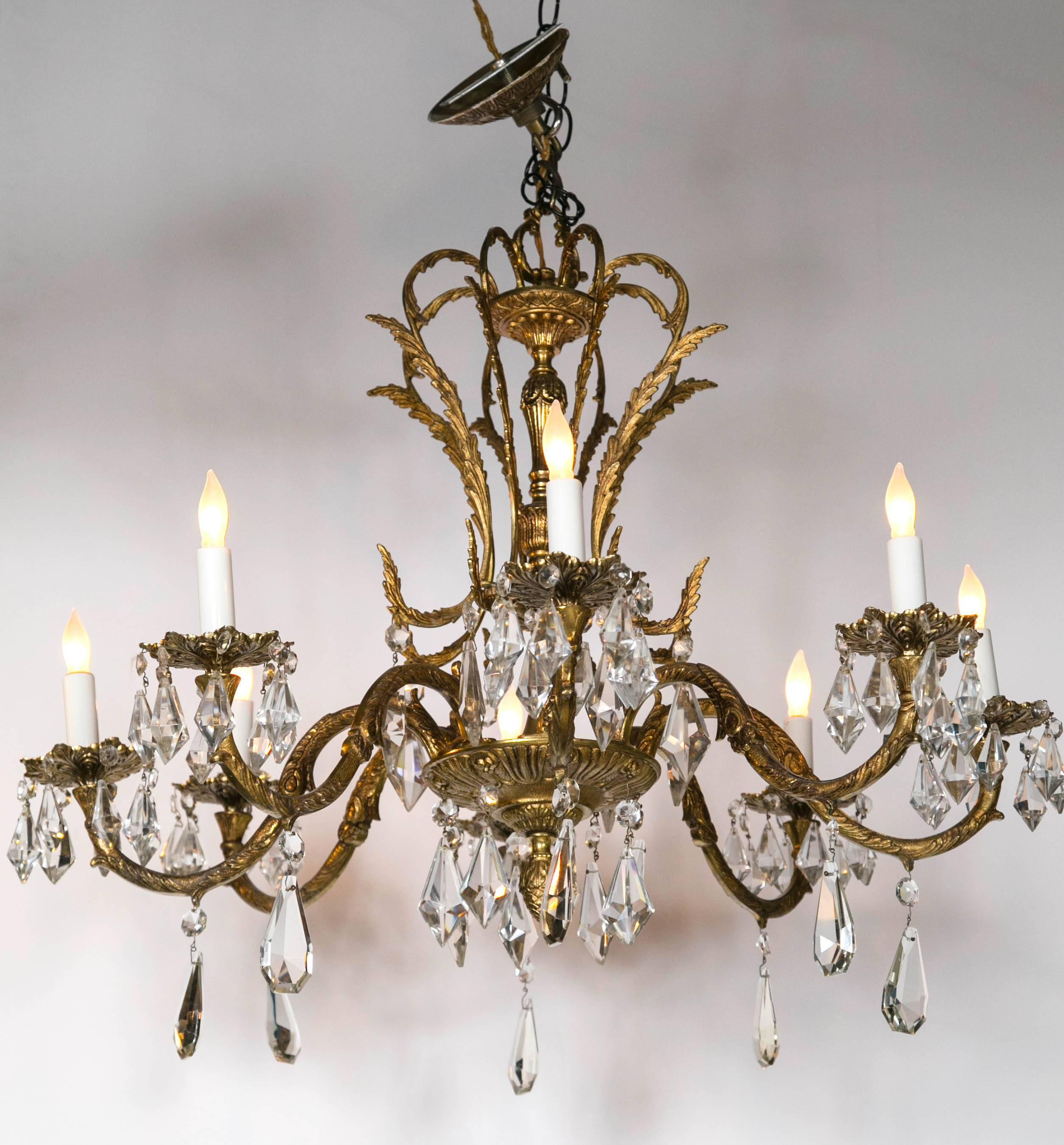 Pair of ornate brass and bronze chandeliers. Kite prisms. Vintage.