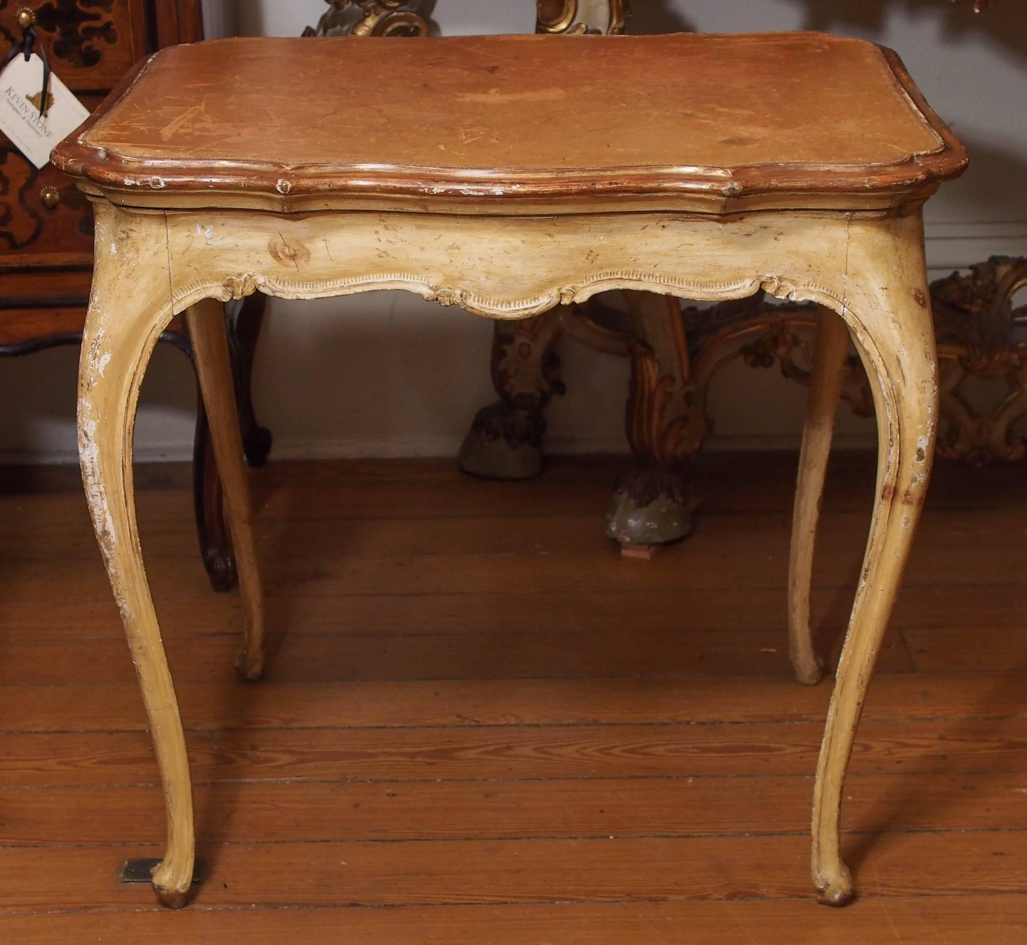 Italian painted Louis XV style table with leather top.