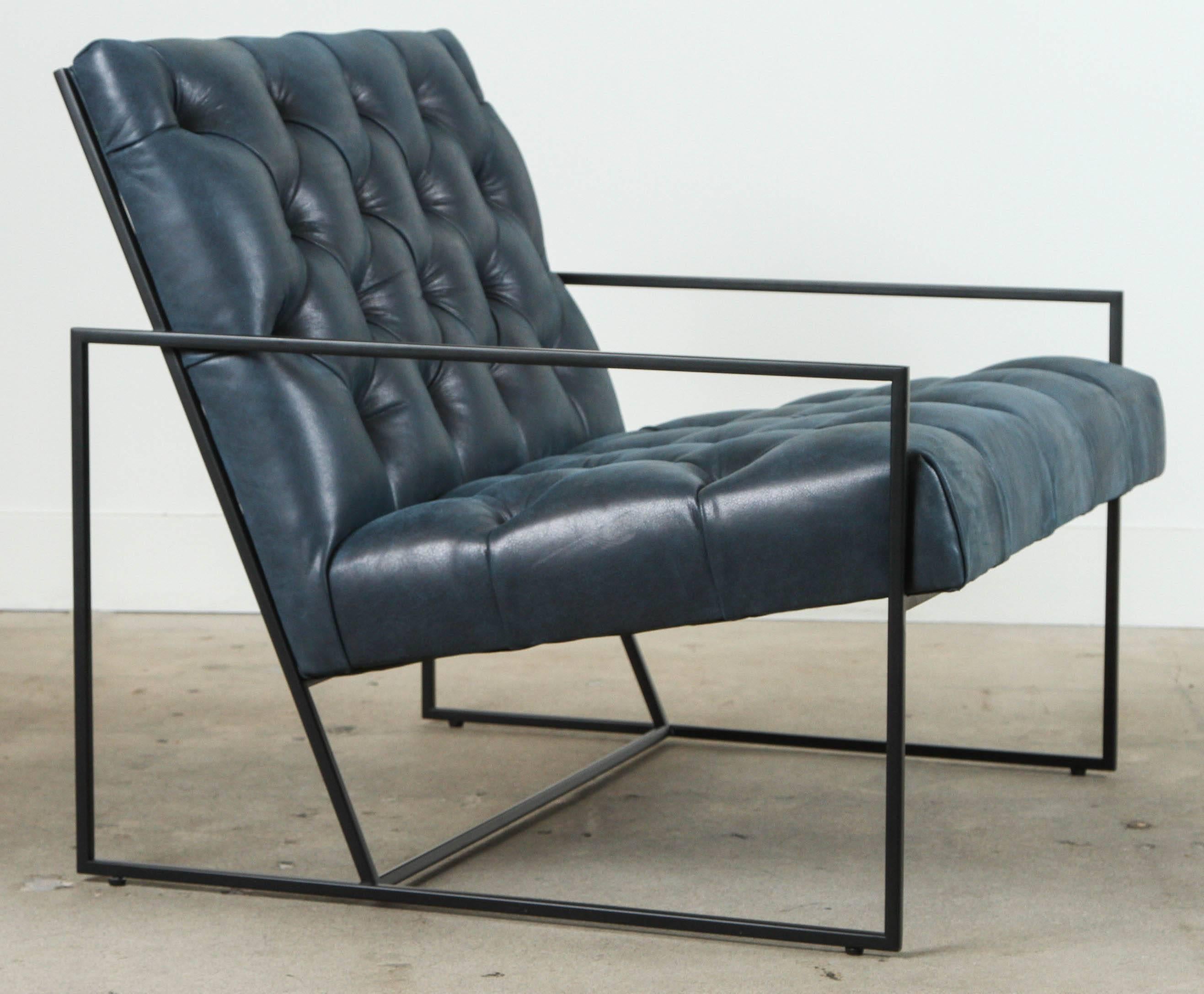 Tufted thin frame lounge chair by Lawson-Fenning in navy leather and matte black powder coat. Available to order in various finishes with a 8 week lead time. 

As shown: $2,656 each.
To order: $1,900 + COM each.
