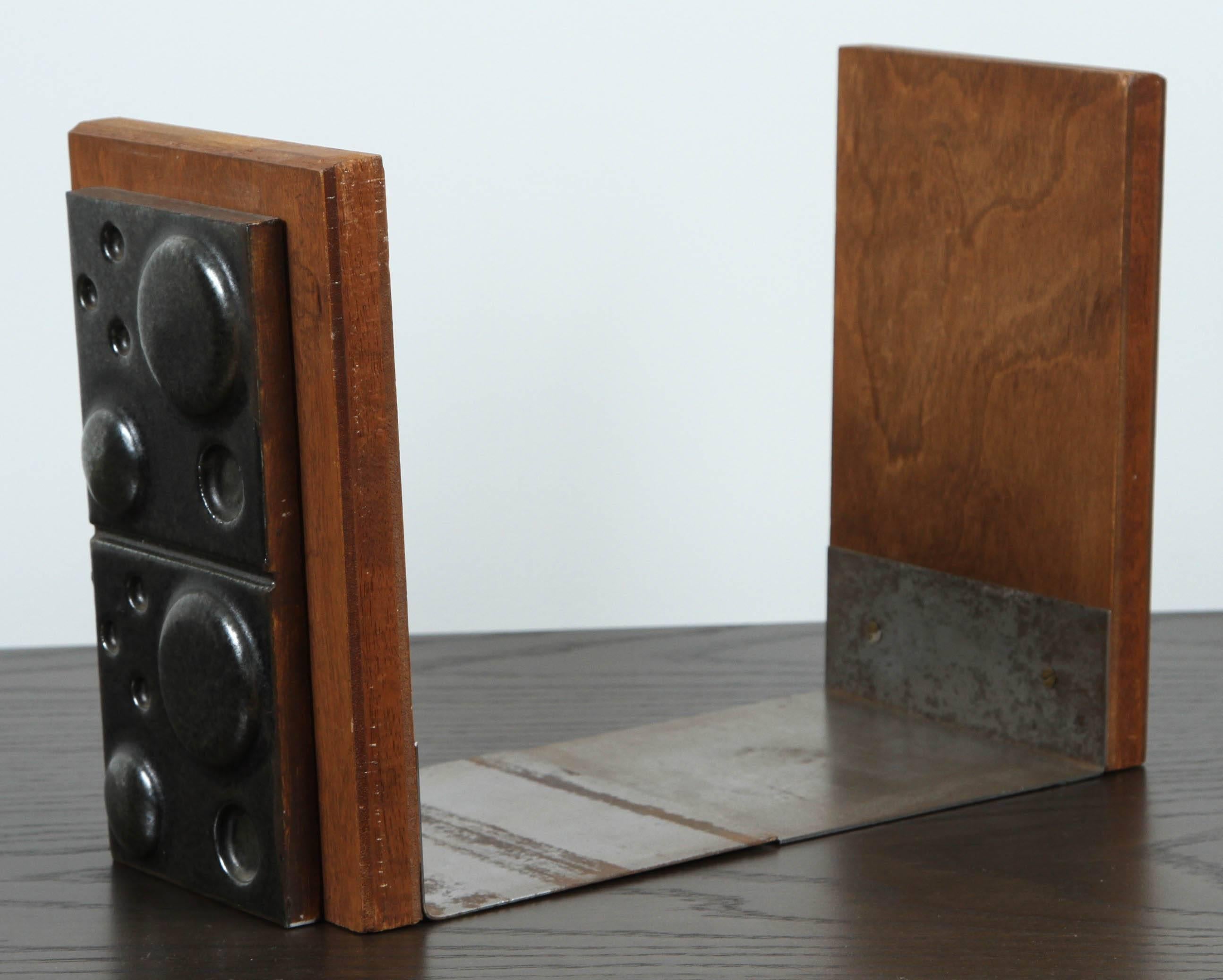 Black ceramic and teak bookends by Martz.