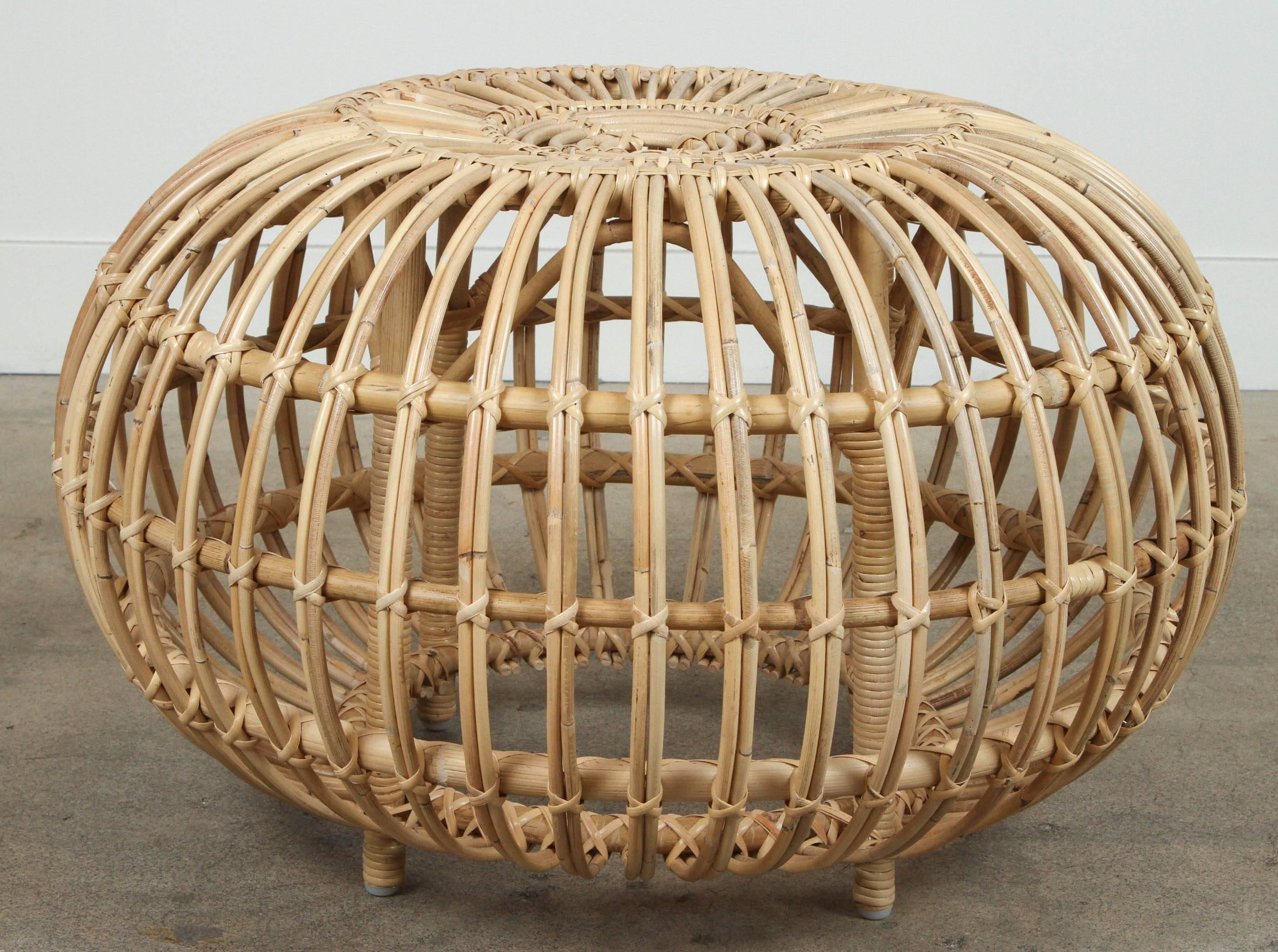 Rattan ottomans by Franco Albini. Current production.

Small - $525
Dimensions: 22" Diameter x 15"H

Large - $650
Dimensions: 26"Diameter x 17"H