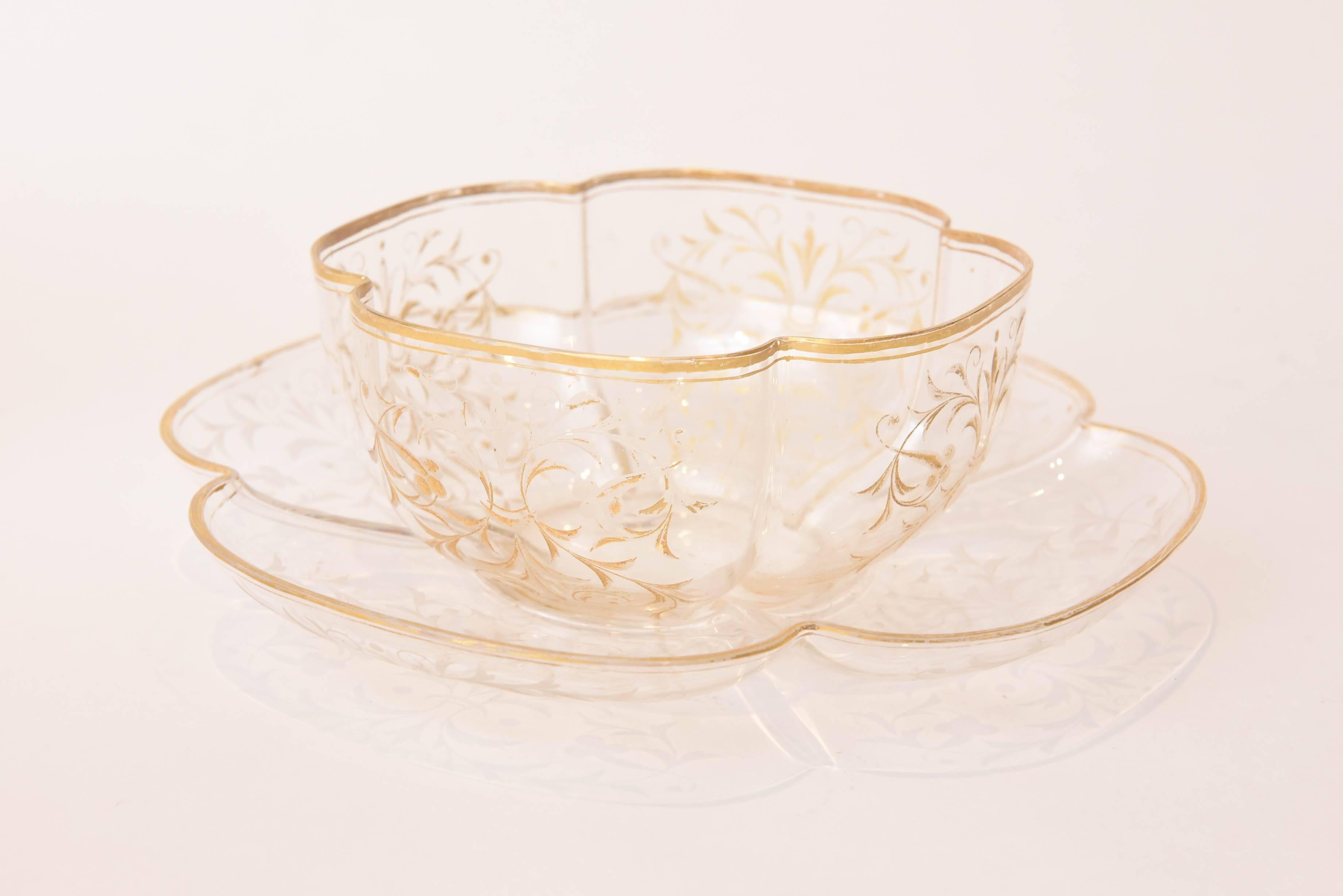 A charming and practical set of ten last quarter of the 19th century moser bowls and underplates in an all-over engraved floral design trimmed in gold. A beautiful and hard to create free blown design that is in wonderful antique condition with no