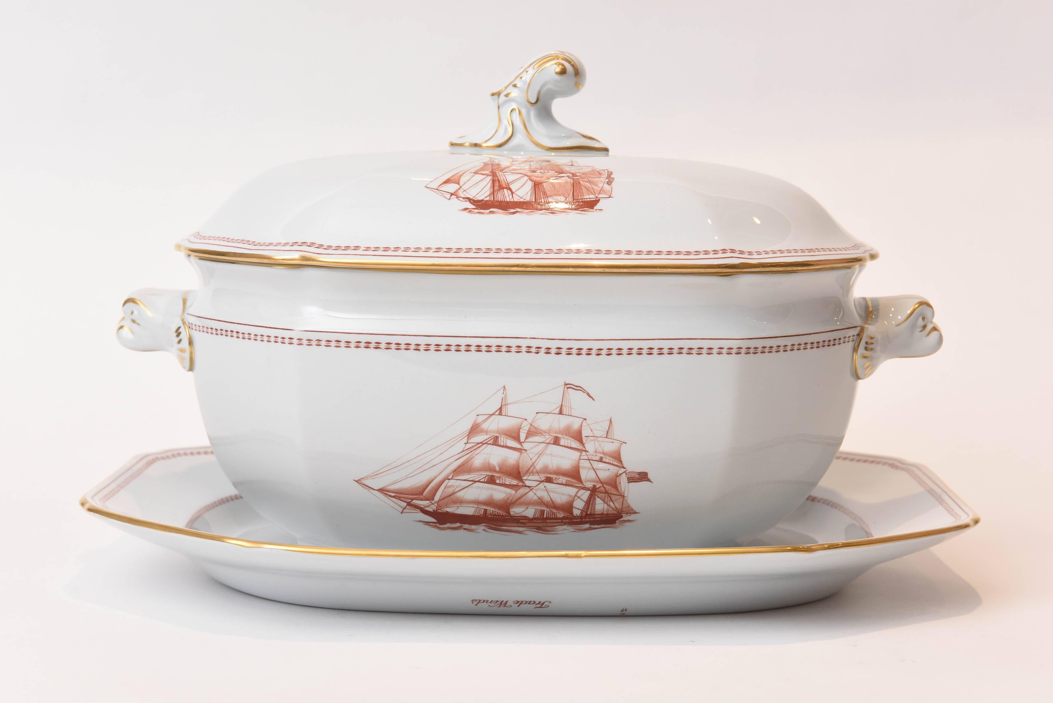 An impressive serving piece (three-part set with tureen, lid and platter) in the hard to find Tradewinds Red featuring a Chinese Export inspired pattern with Foo dog handles. Trimmed in 24-karat gold and made from Spode's blue grey porcelain known