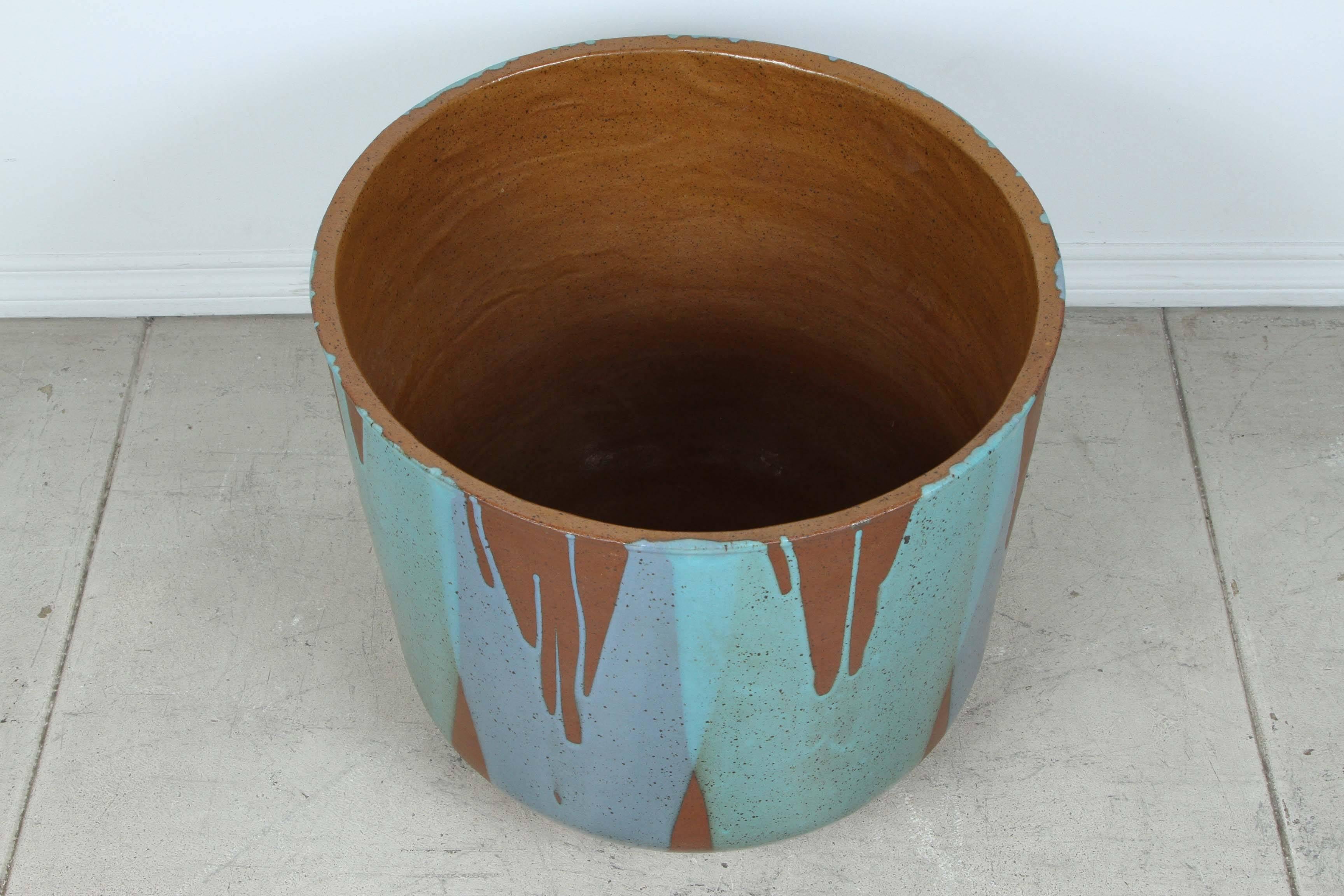 Large David Cressey planter for Architectural Pottery. Two color (blue and teal) flame glaze over unglazed outer body with glazed interior. This is model number 4108 from the Architectural Pottery catalog with custom glaze colors.