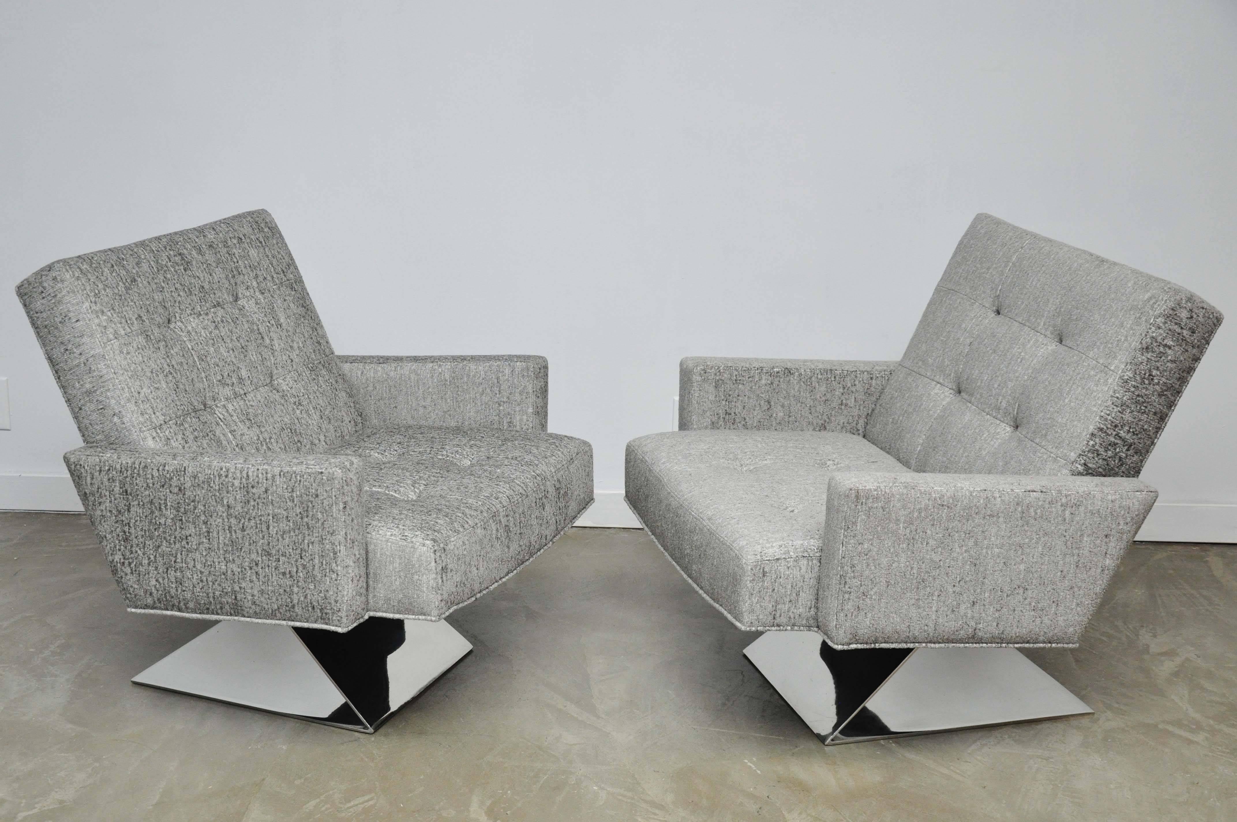 Rare cantilever base lounge chairs by Milo Baughman. Solid stainless steel chrome bases. Fully restored. Newly upholstered. One of Milo Baughman's finest designs!
