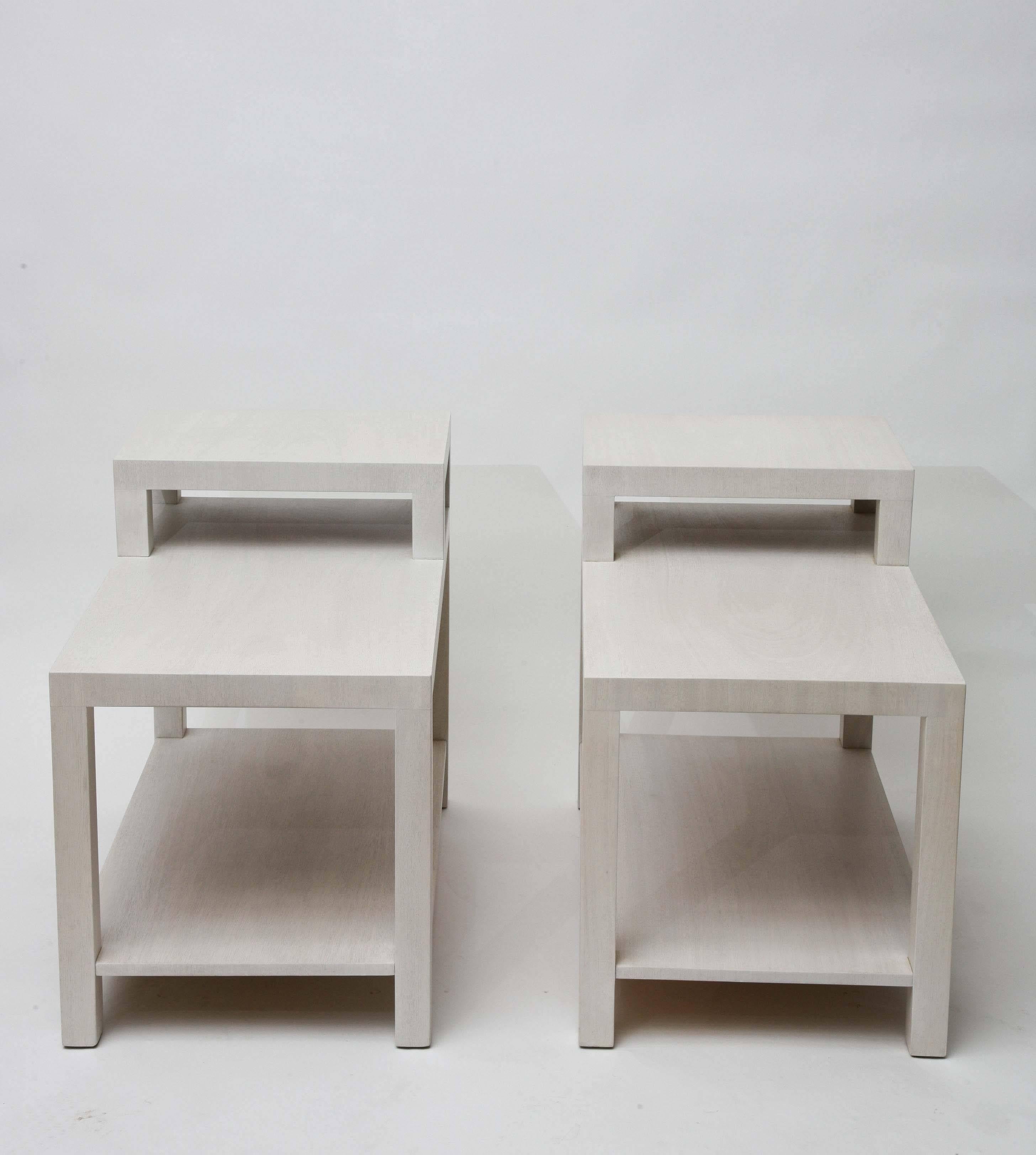 Stunning custom-bleached mahogany stepped end tables or nightstands, designed by T.H. Robsjohn-Gibbings for Widdicomb. Beautifully grained mahogany in dreamy shades of pale cream and whispery grey is sure to put you to sleep with a smile! Stamped to