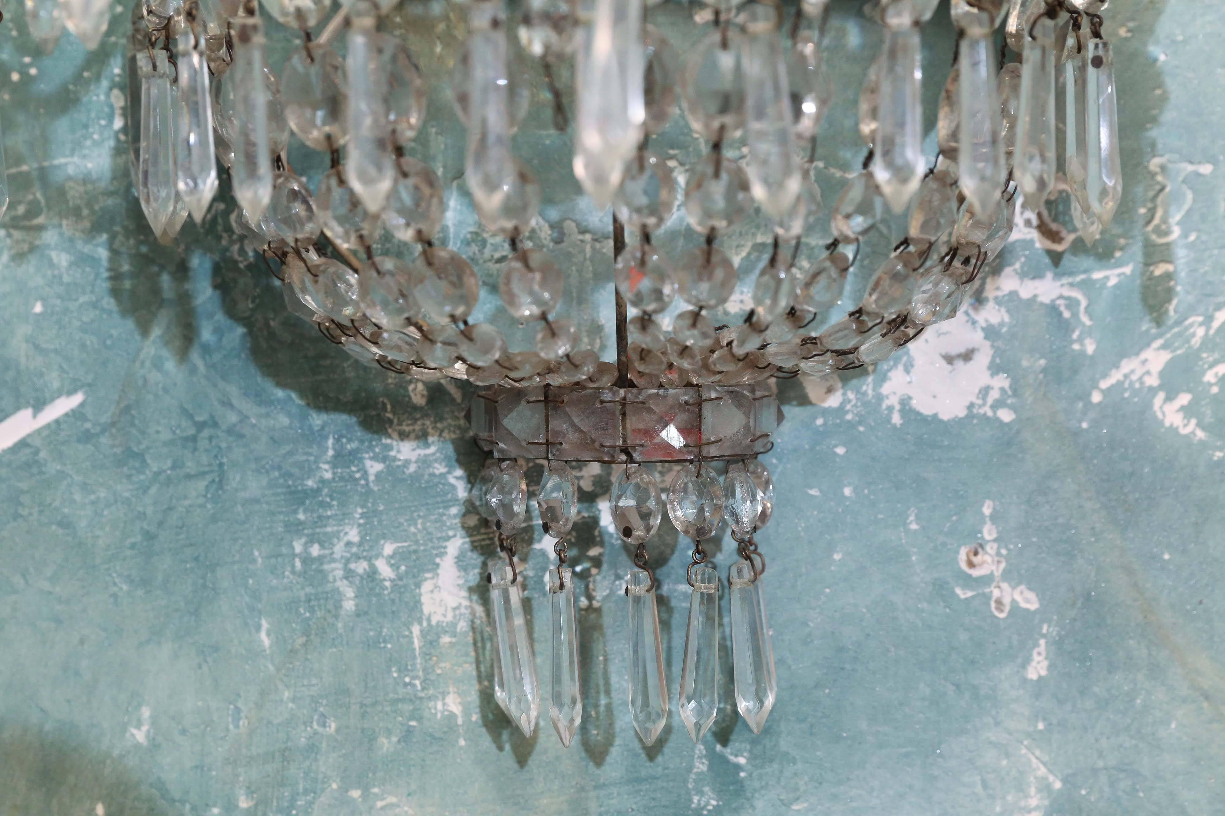 Pair of vintage Italian crystal and iron two-arm sconces. Newly wired.