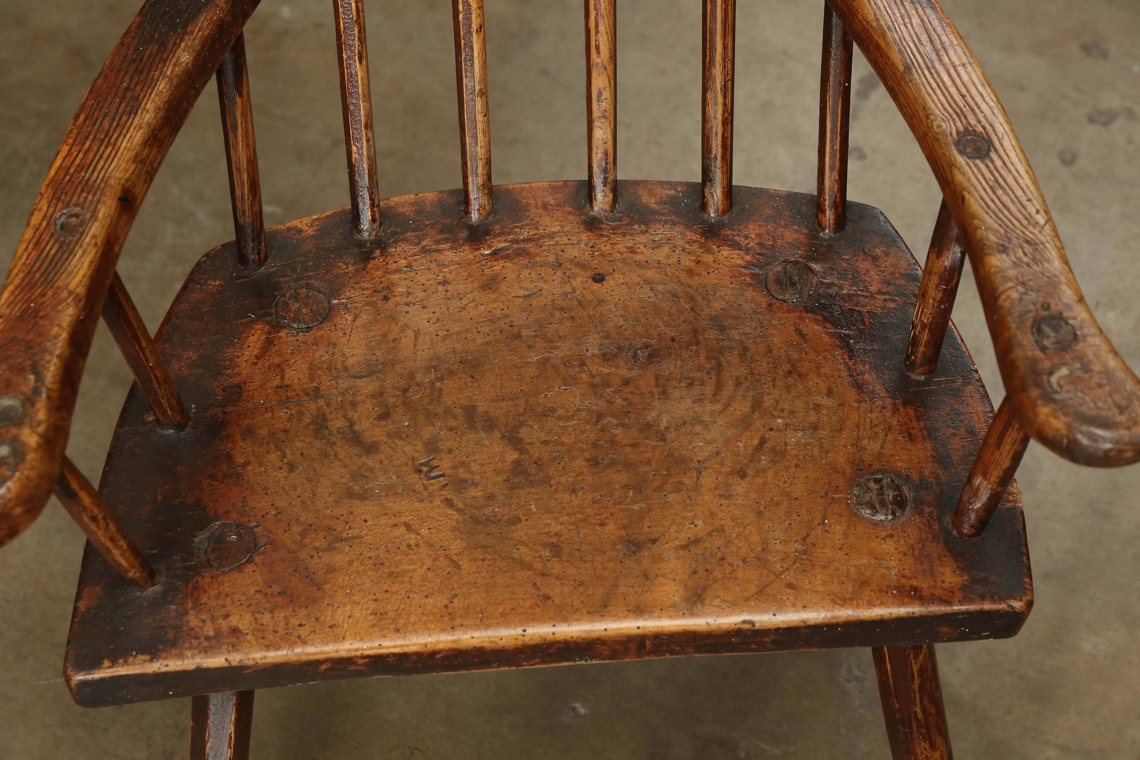 Folk Art stick chair from the English Countryside. Thick seat and surprisingly comfortable. Wonderful piece of sculpture with great patina. Seat height is 13.75 inches.