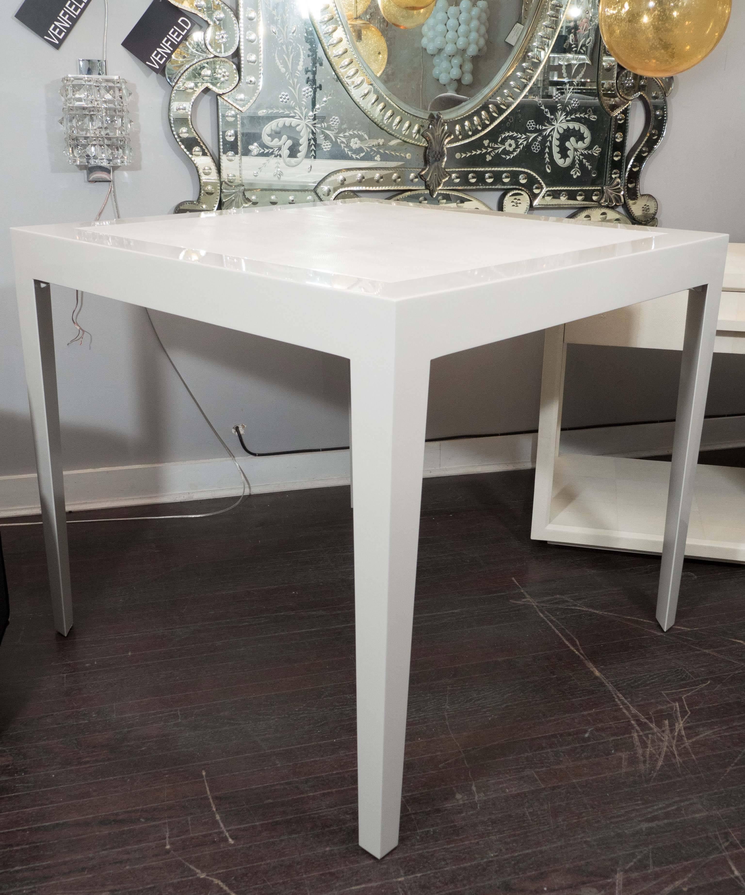 Custom, made to order ivory lacquer games table with water gray shagreen inset top trimmed with bone inlay.  

For finish and color options please inquire with Venfield, 