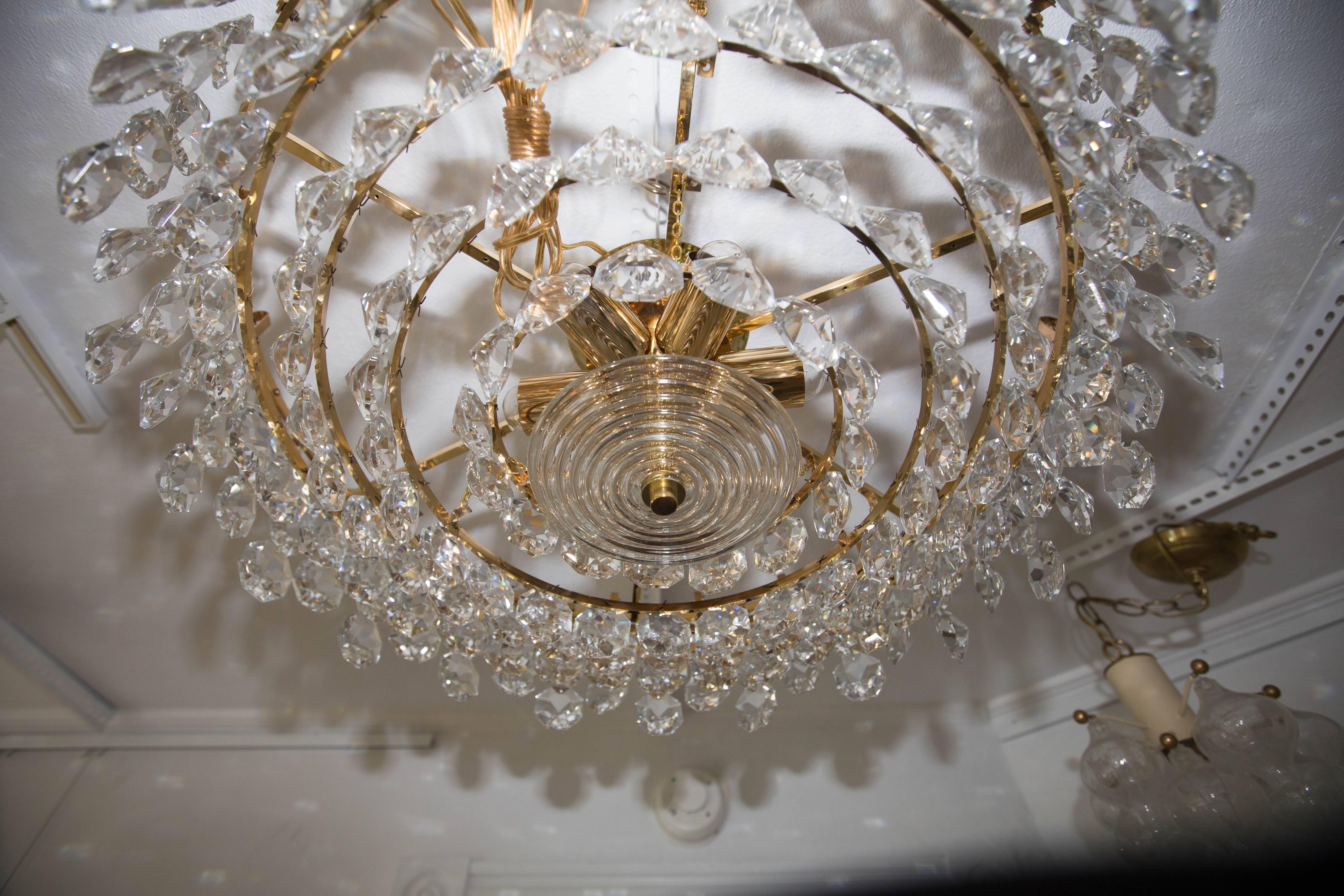 Austrian Tiered Brass and Facet Cut-Glass Element Chandelier For Sale