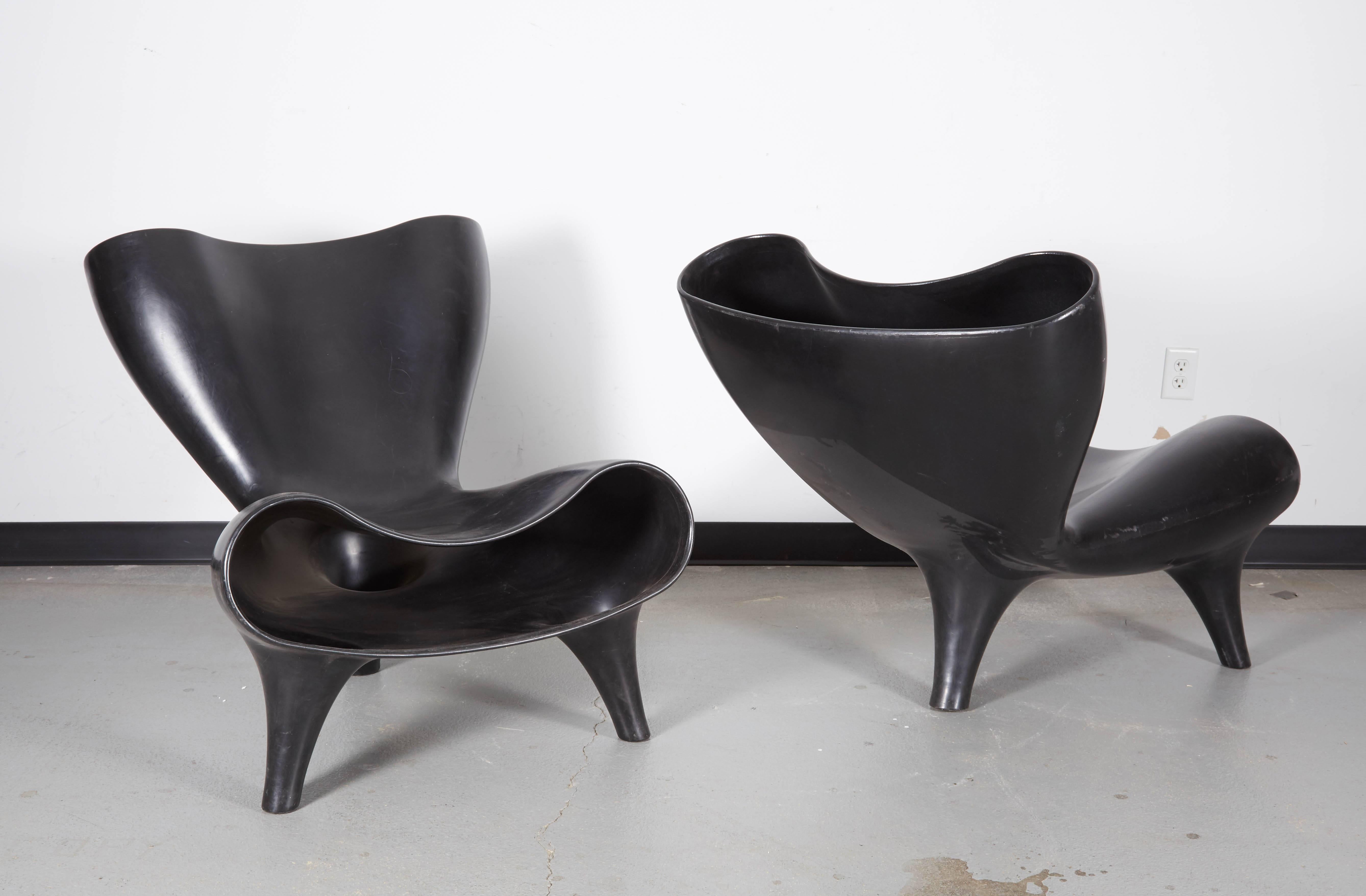 Newson created this rotation-molded polypropylene version of the Orgone chair in 1998. With Marc Newson molded mark on underside of seats. This pair is from the Barneys, New York collection and does some wear to the surface.