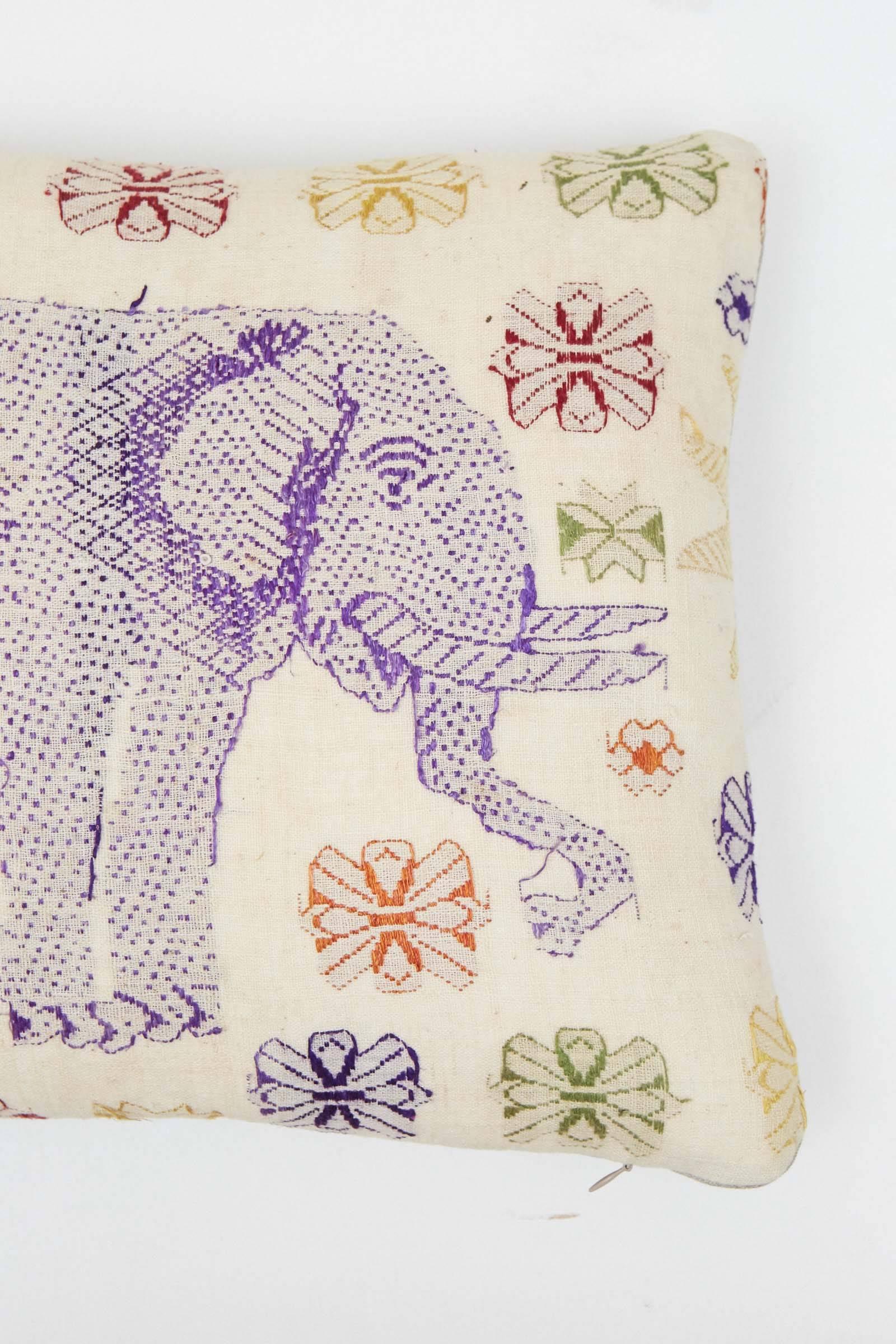 Vintage Tai (Ethnic minority group resident in Laos and Vietnam) hill tribe textile pillow. Hand embroidery. Cotton floss on handwoven linen fabric. Elephant motif. Natural linen back, invisible zipper and feather and down fill. Measures: 14 x 18.
 