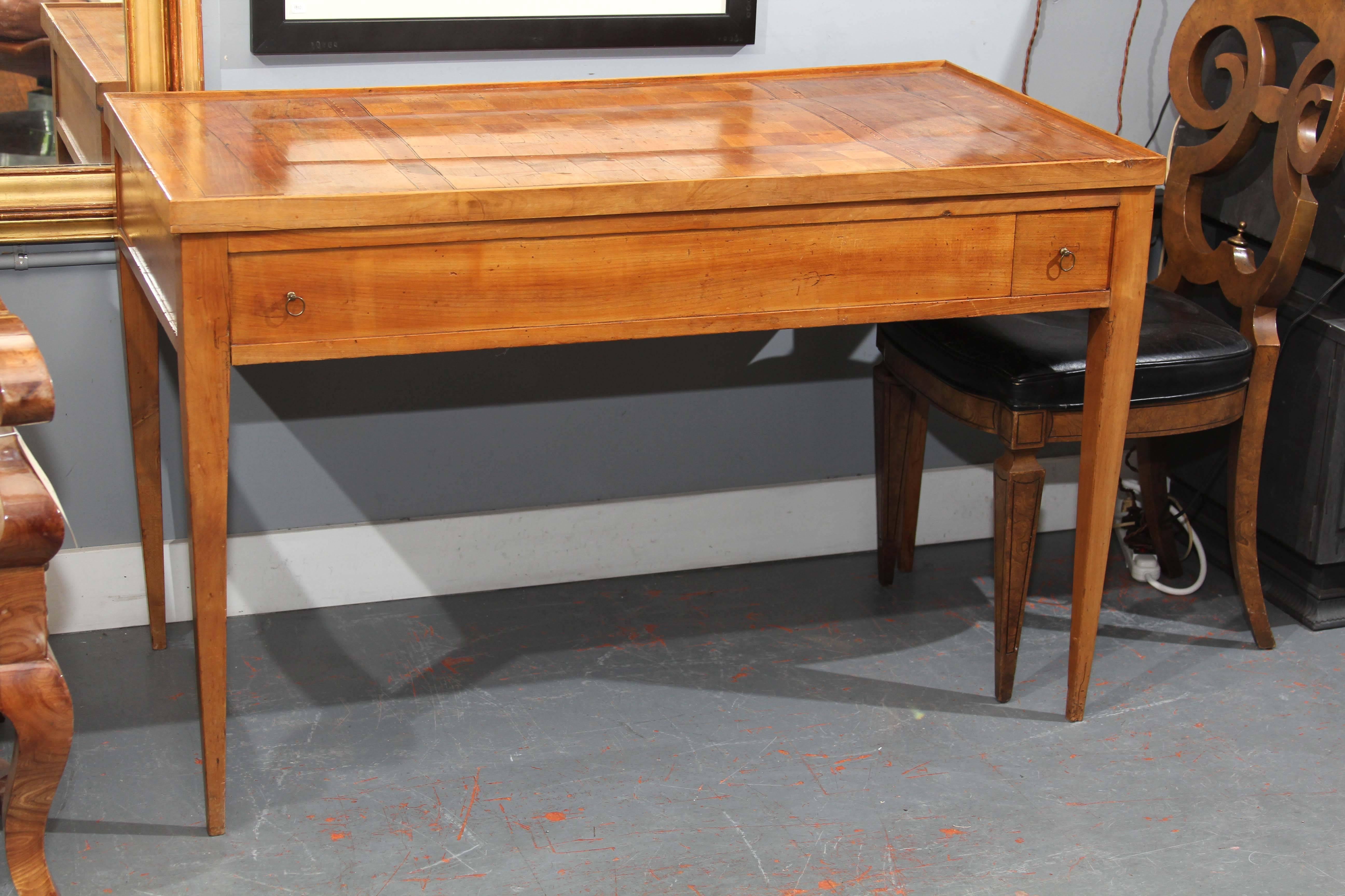 Lovely lift top game table with two drawers. Top lifts off and flips over to sit on top again with a felt lined playing surface. This would also make a perfect entry table or nice dining table for two.