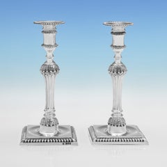 Pair of Victorian cast sterling silver candlesticks made in London in 1898