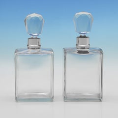 Art deco pair of glass and sterling silver decanters made by Hukin & Heath 1921