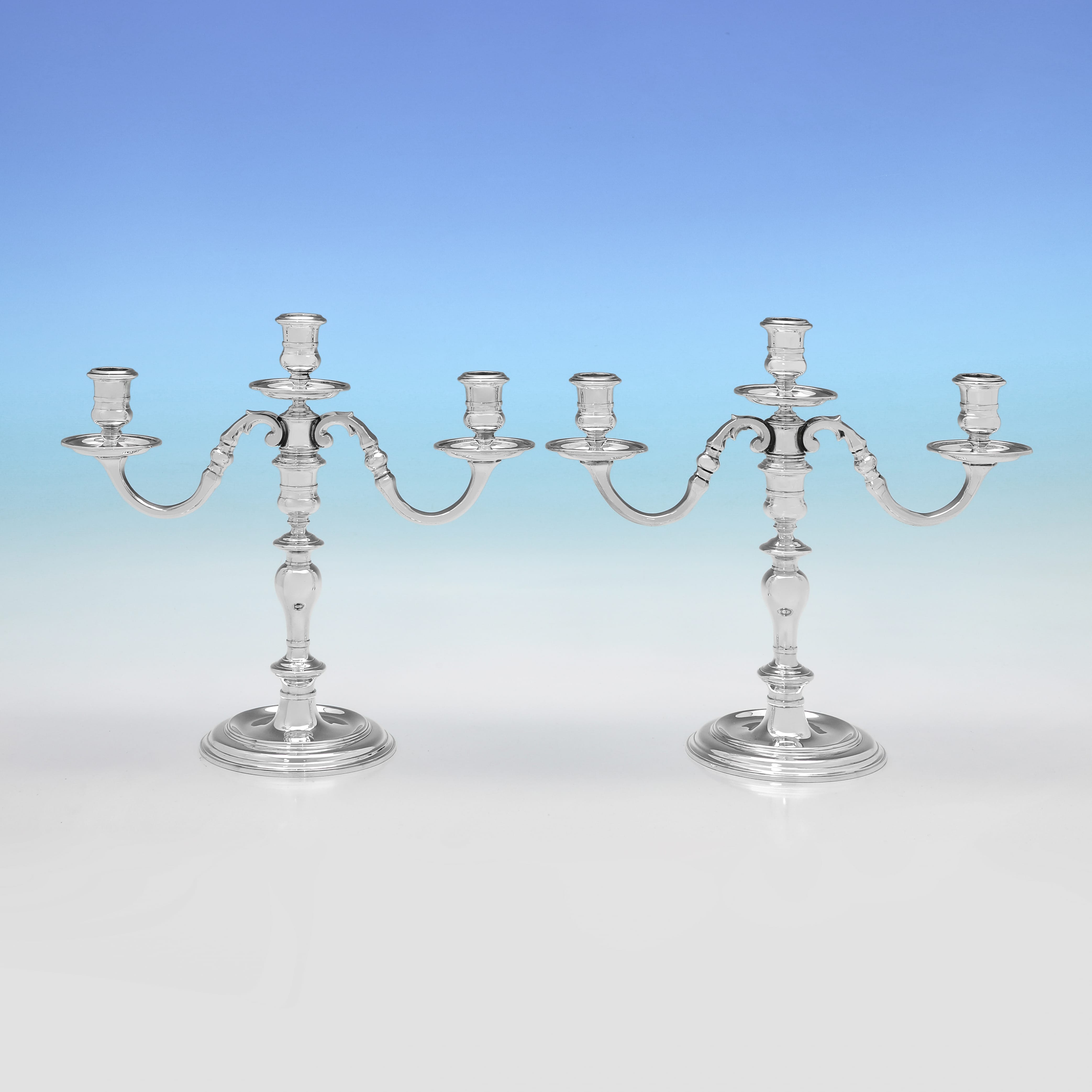 Pair of cast sterling silver 3 light candelabra made in 1977