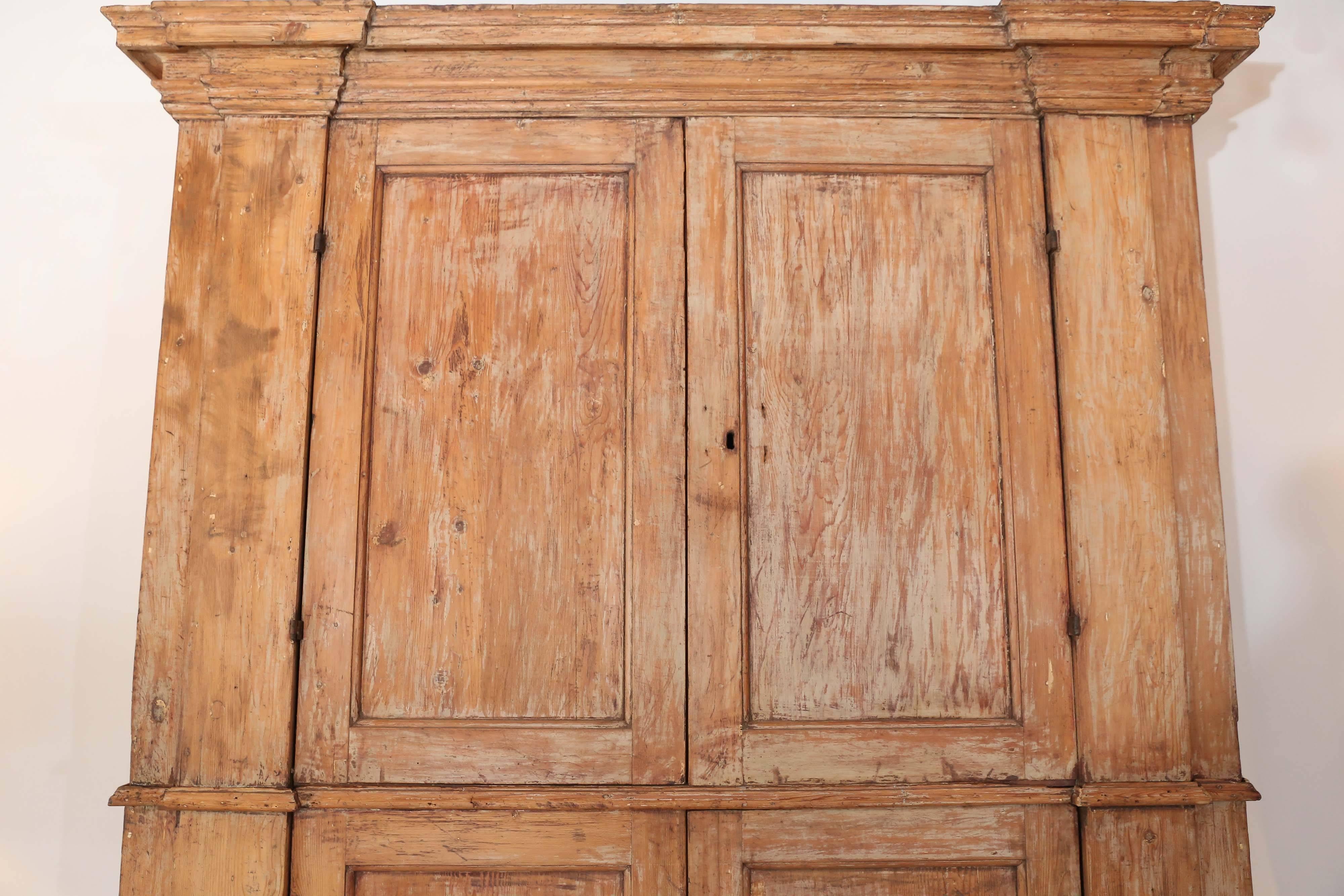 This is so impressive in person and great if you have tall ceilings.
It is a two part Italian pine 18th century cabinet with the original paint and simple elegant moldings. Width with at the top crown is 80