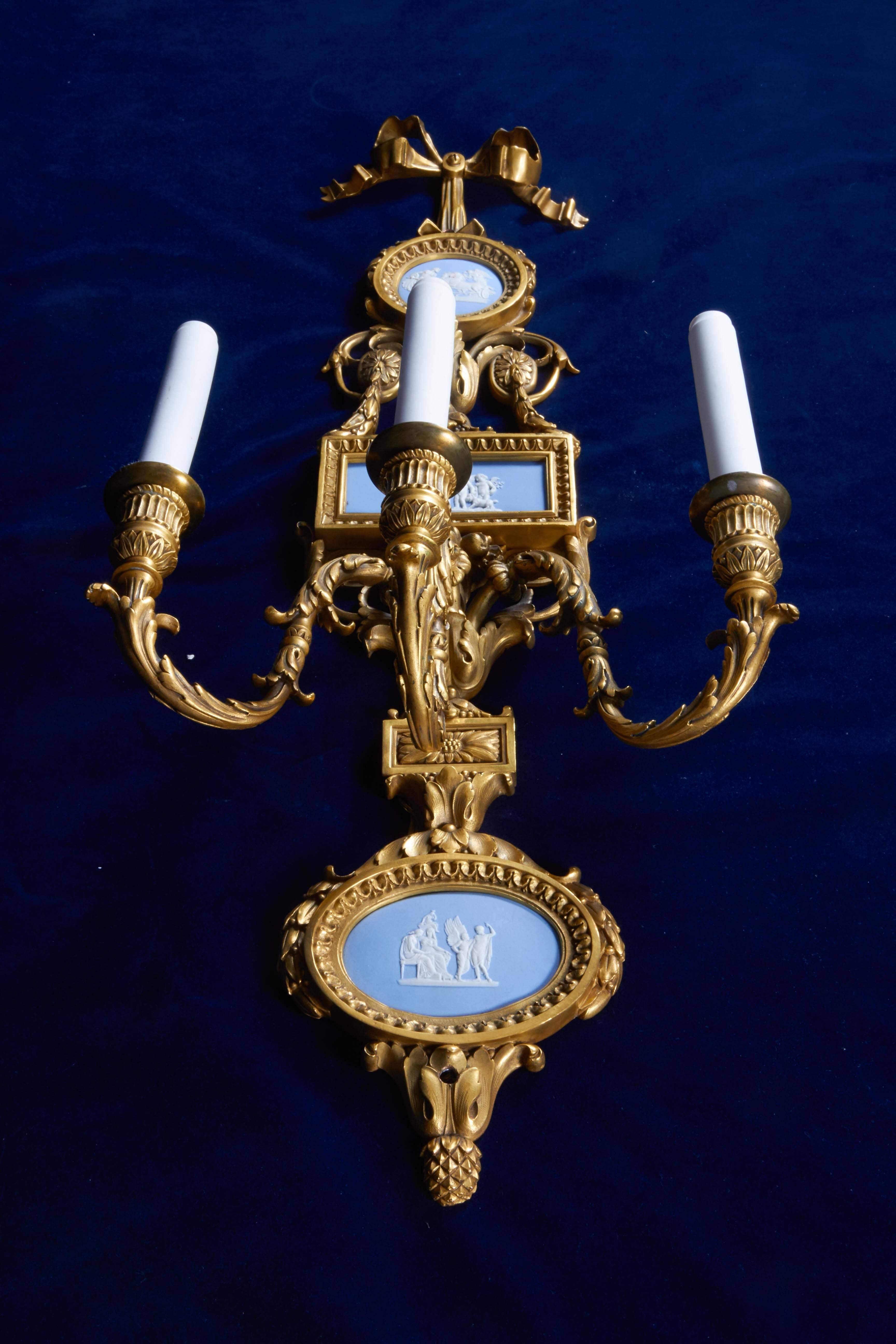 Pair of Louis XVI Doré Bronze and Wedgwood Three-Light Sconces, E. F. Caldwell For Sale 1