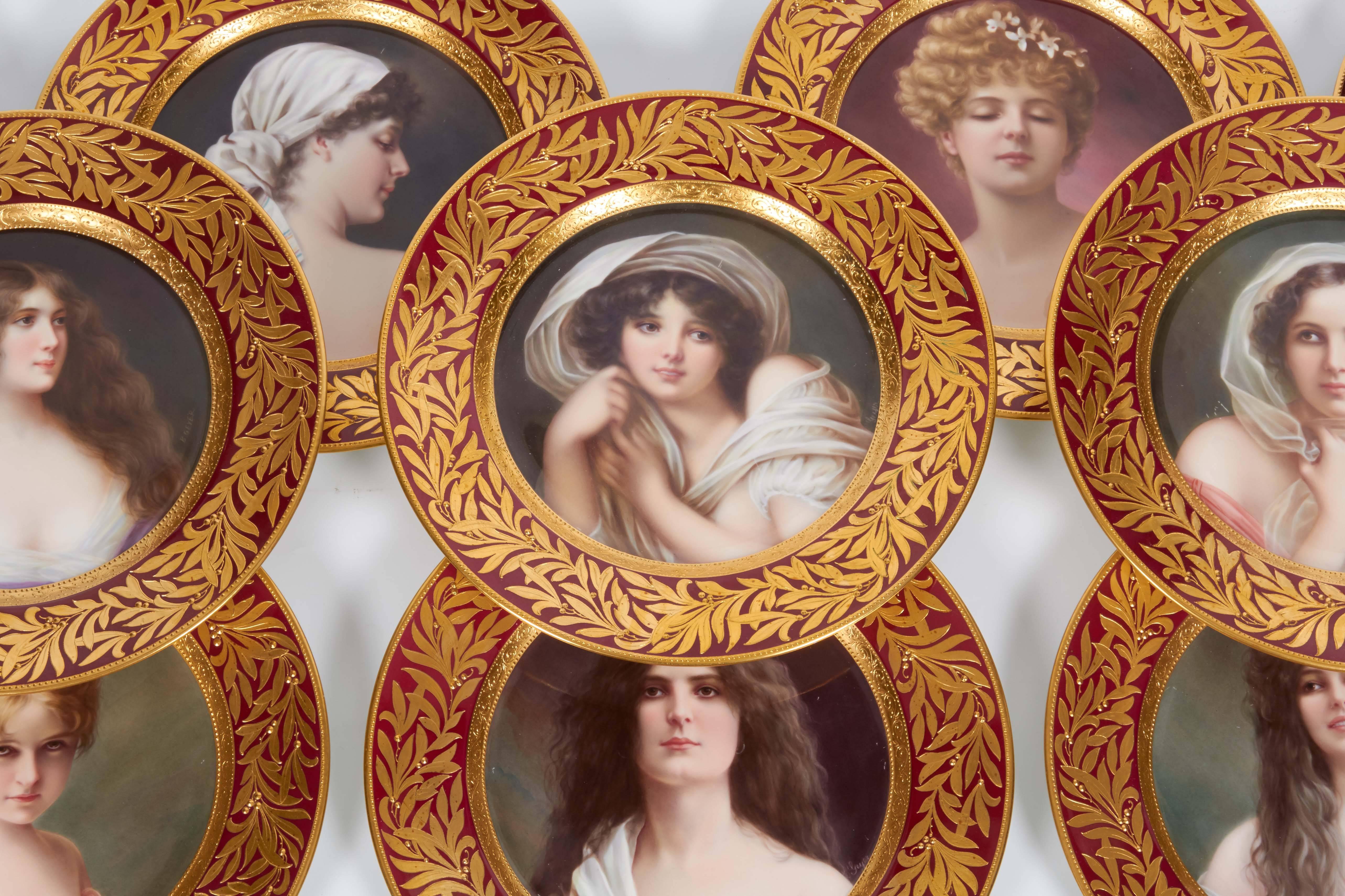 A complete and original set of 12 American, Transitional Ceramic Art Company/Lenox Porcelain, Vienna Style Burgundy-Ground Portrait Plates,
1904-1905, gilt CAC monogram and wreath, gilt and impressed uppercase marks, retailer's mark for Tiffany &