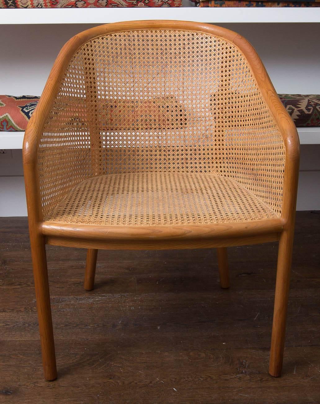 Pair of Ward Bennett chair. Wood and cane.