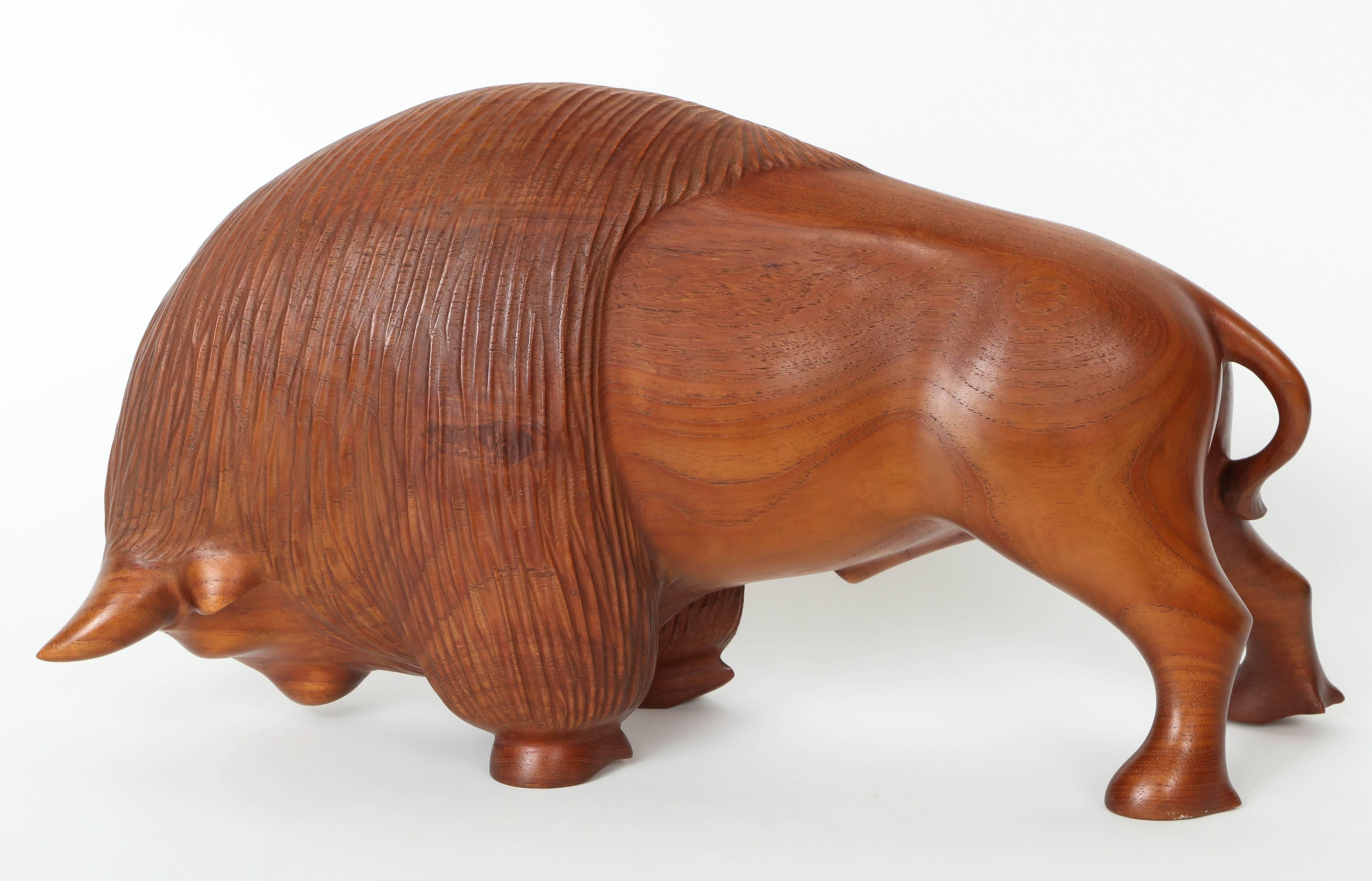 A Danish carved teakwood bison, circa 1953.
Originally purchased from Den Permanente in 1953, Copenhagen as a gift to the former owner for service in the Copenhagen Commune. 

Den Permanente was a Co-operative institution for the exhibition of