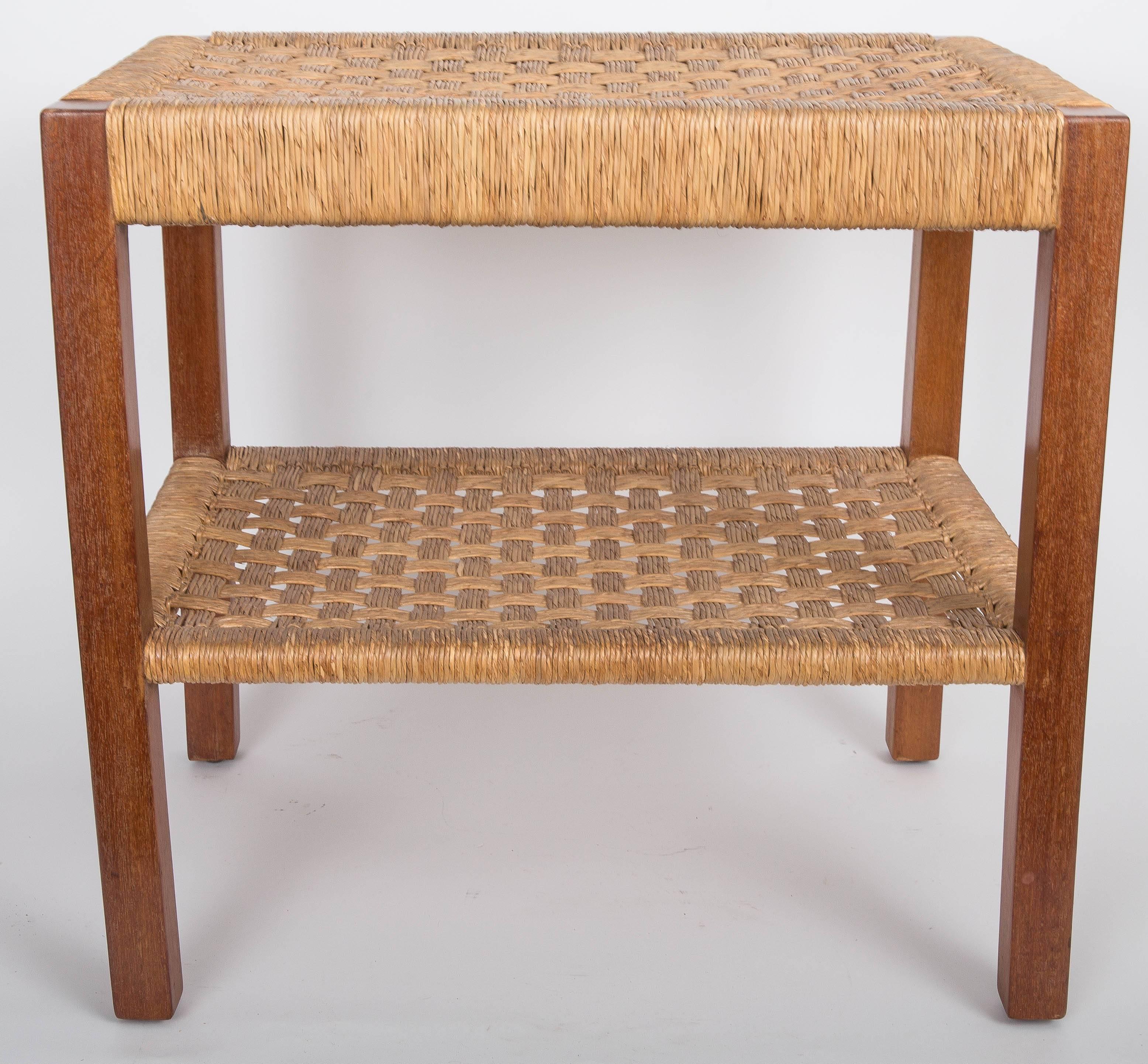 Side table with two shelves in walnut and rush.