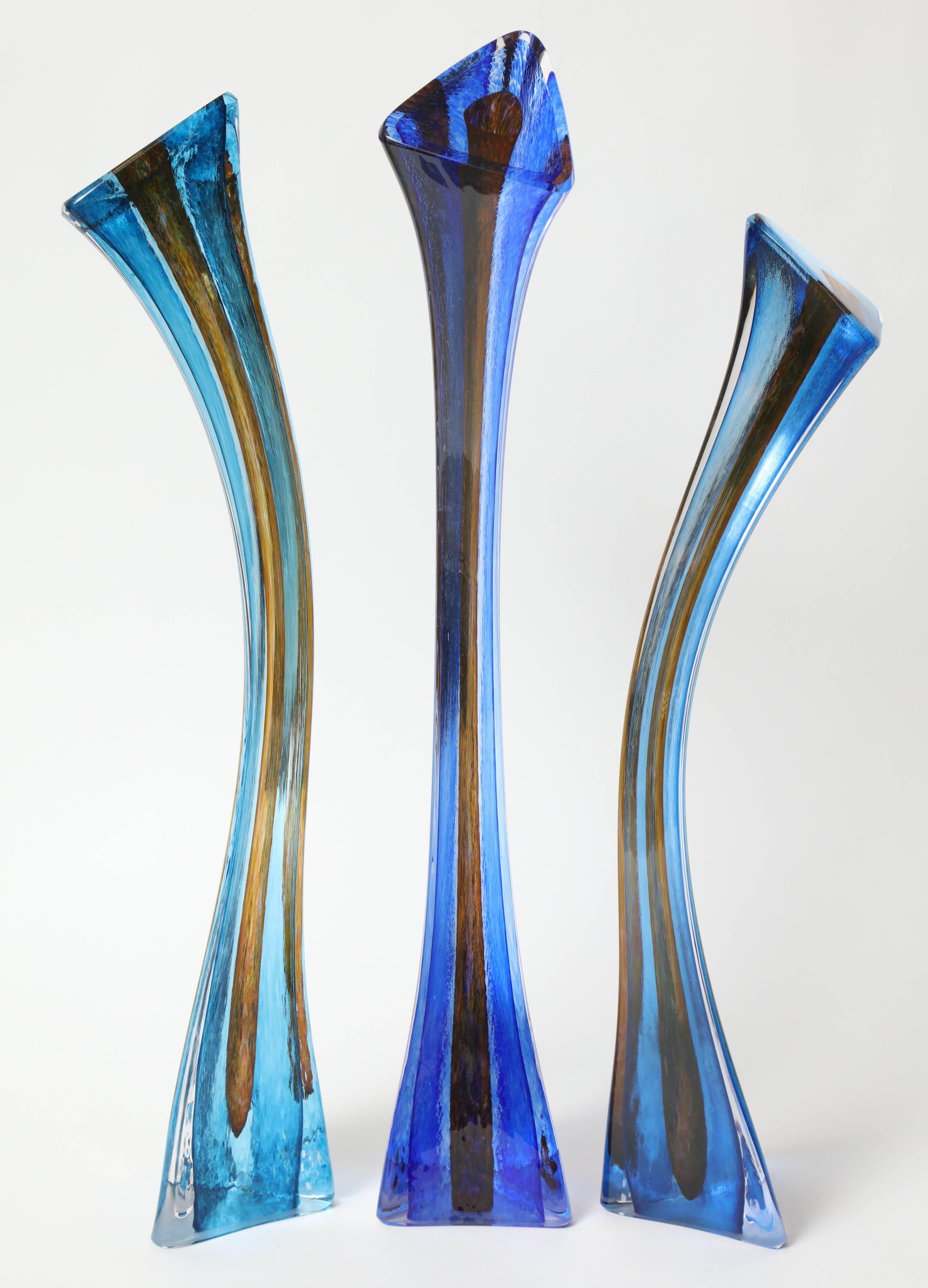 Contemporary American artist Barry Entner's "Triangle Solids" glass sculpture is created with consideration of each individual piece as paint strokes that, once assembled, becomes the desired composition. He doesn't make these using