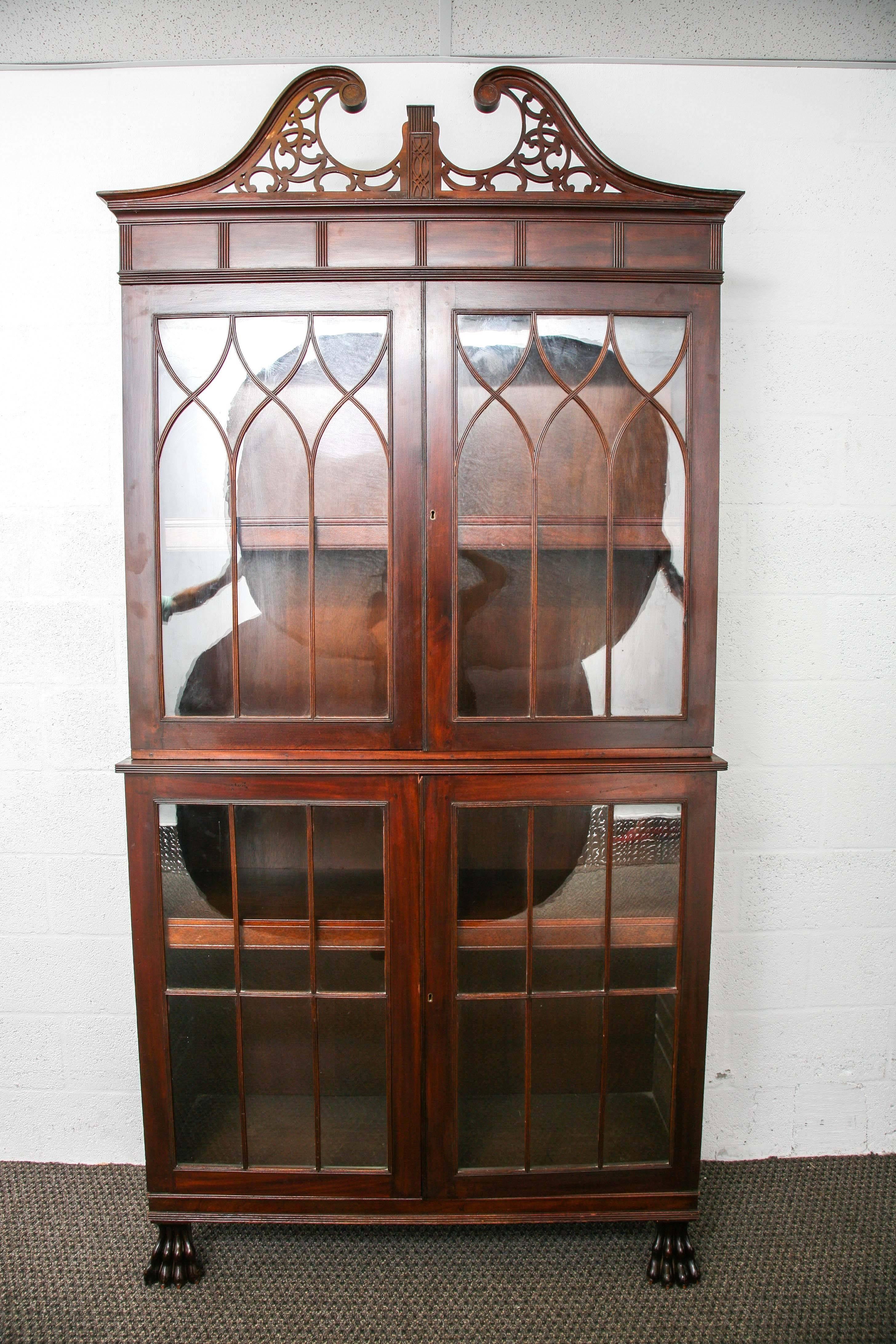 
This is a very nice mahogany bookcase, from an estate in Palm Beach Florida.
Its antique made in the 1800s possibly federal, its been in the family for many years.
The top has two doors with all individual small pains of original glass and also