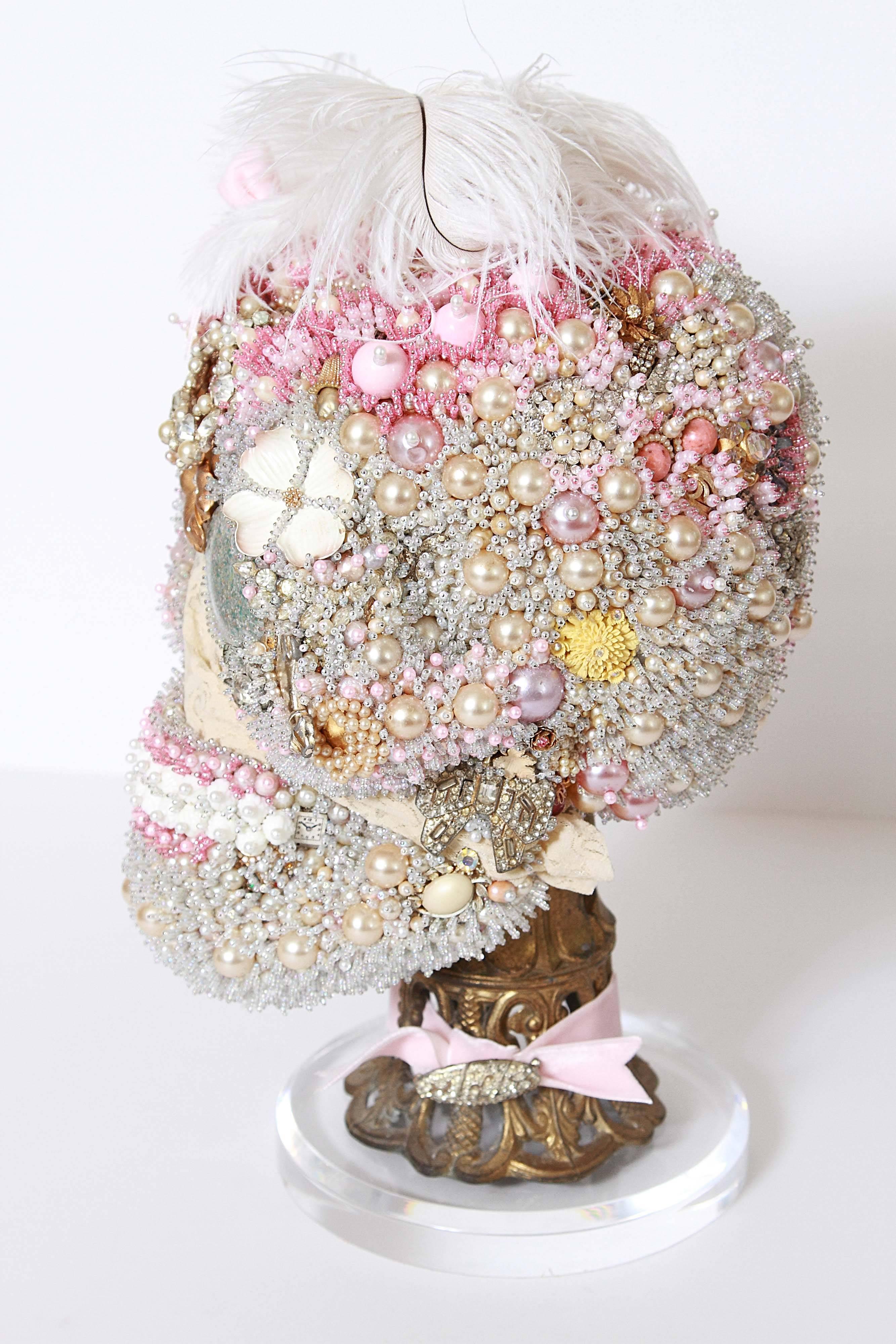La Tête de Marie Antoinette by Peyton Hayslip.
Date of Fabrication: 2016.

This one of a kind, handcrafted Marie Antoinette beaded sculpture is made with vintage beads, brooches, cufflinks, and pearls, Italian porcelain rose, art glass, seed
