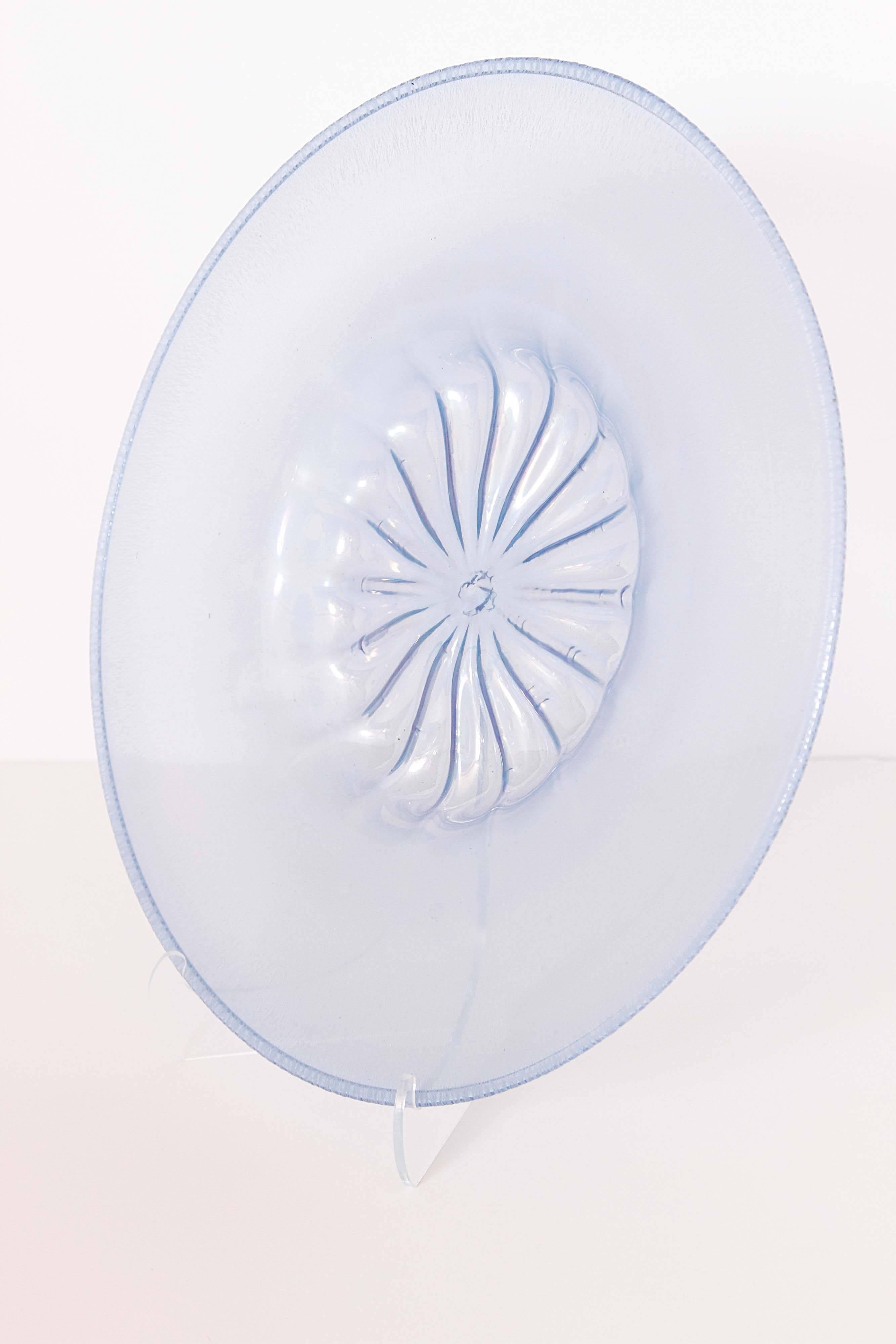 Large Venetian glass plate with intricate detail in the center, clear blue.