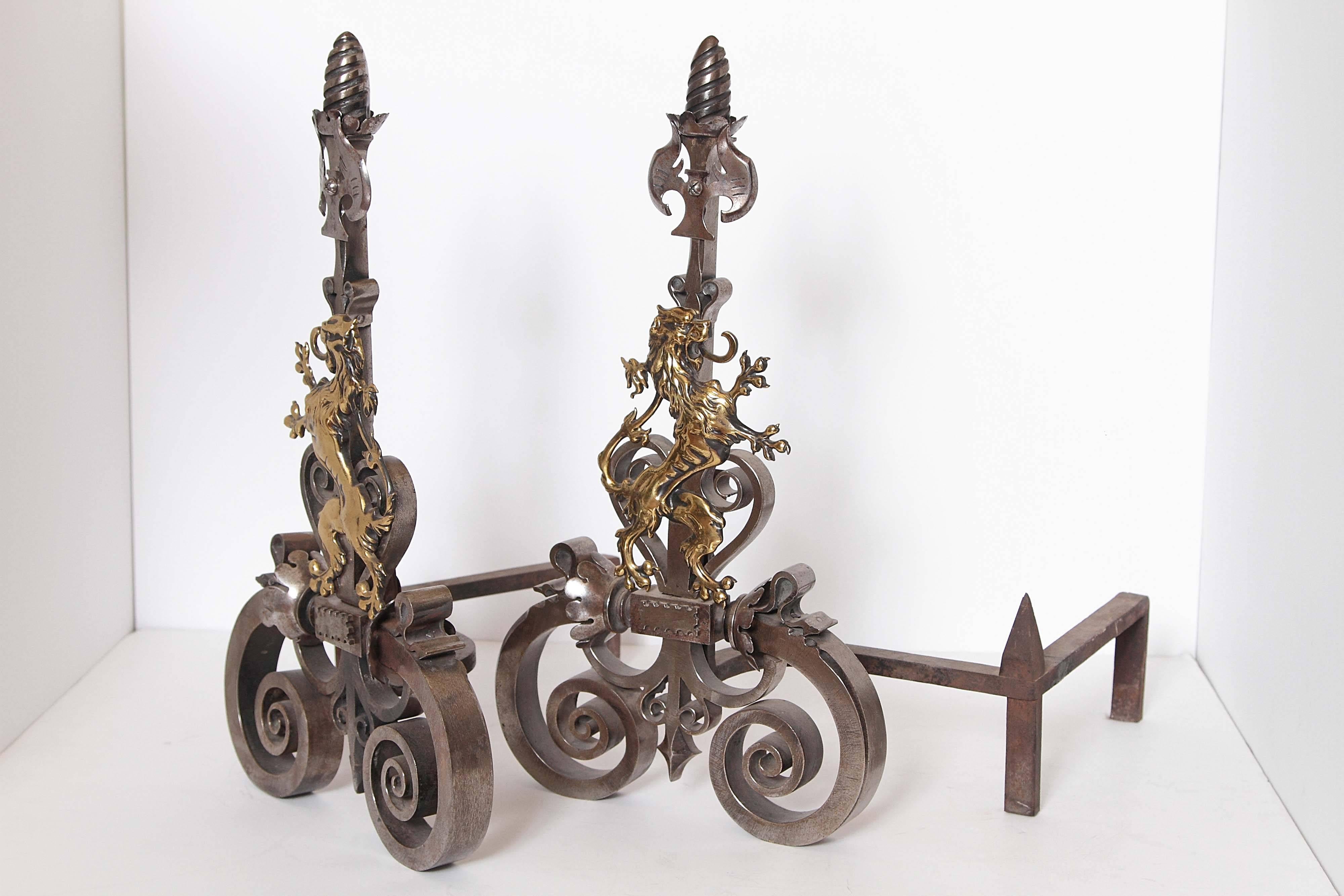 A beautiful pair of hand-wrought andirons with polished bronze dragons.
