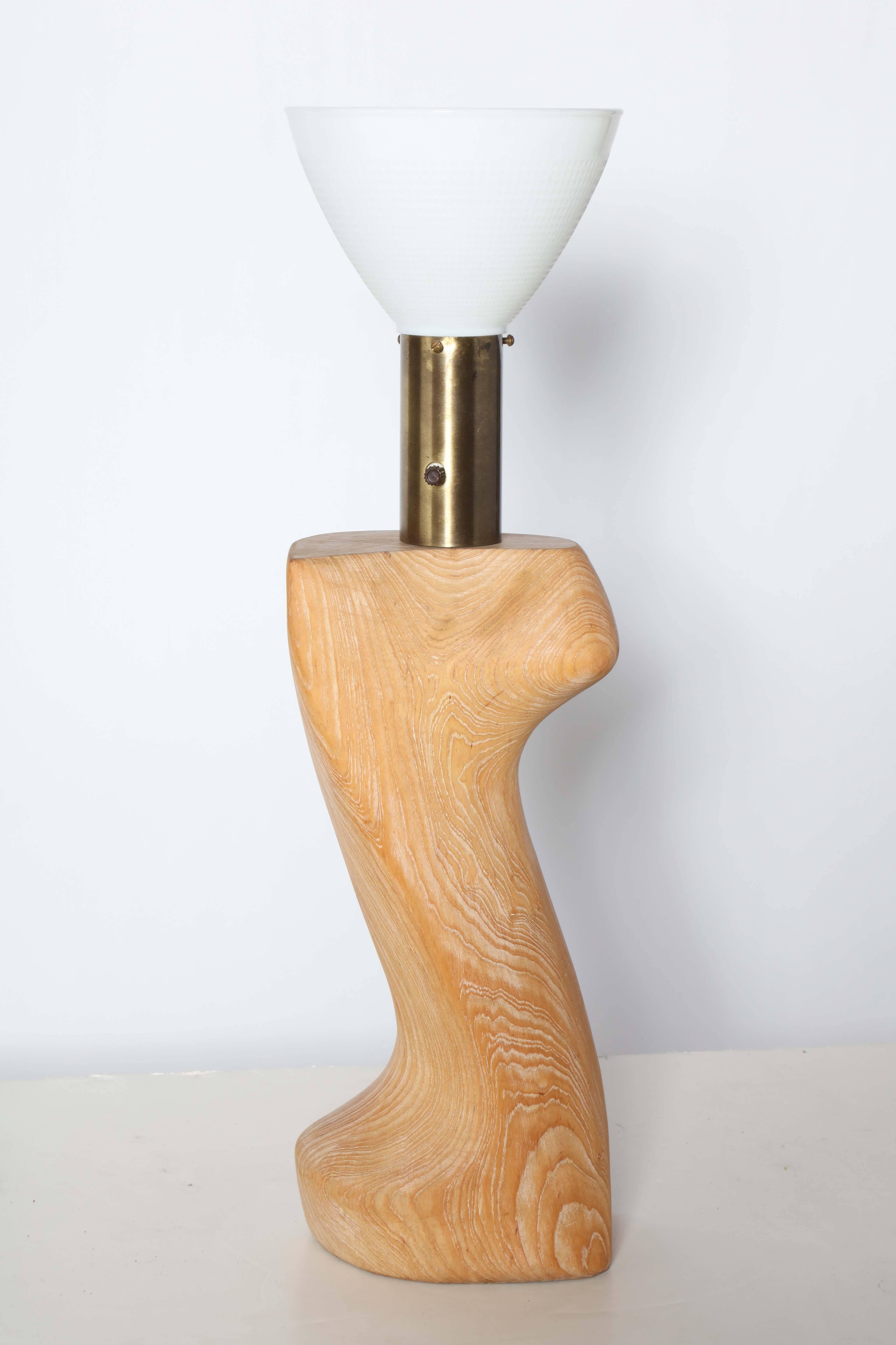 Large Organic Modern Yasha Heifetz and Light House Lamp and Lamp Shade Co. of California solid limed ash, brass table lamp with white glass shade. Featuring lightly cerused and slightly biomorphic carved ash form with wide cylindrical brass neck and
