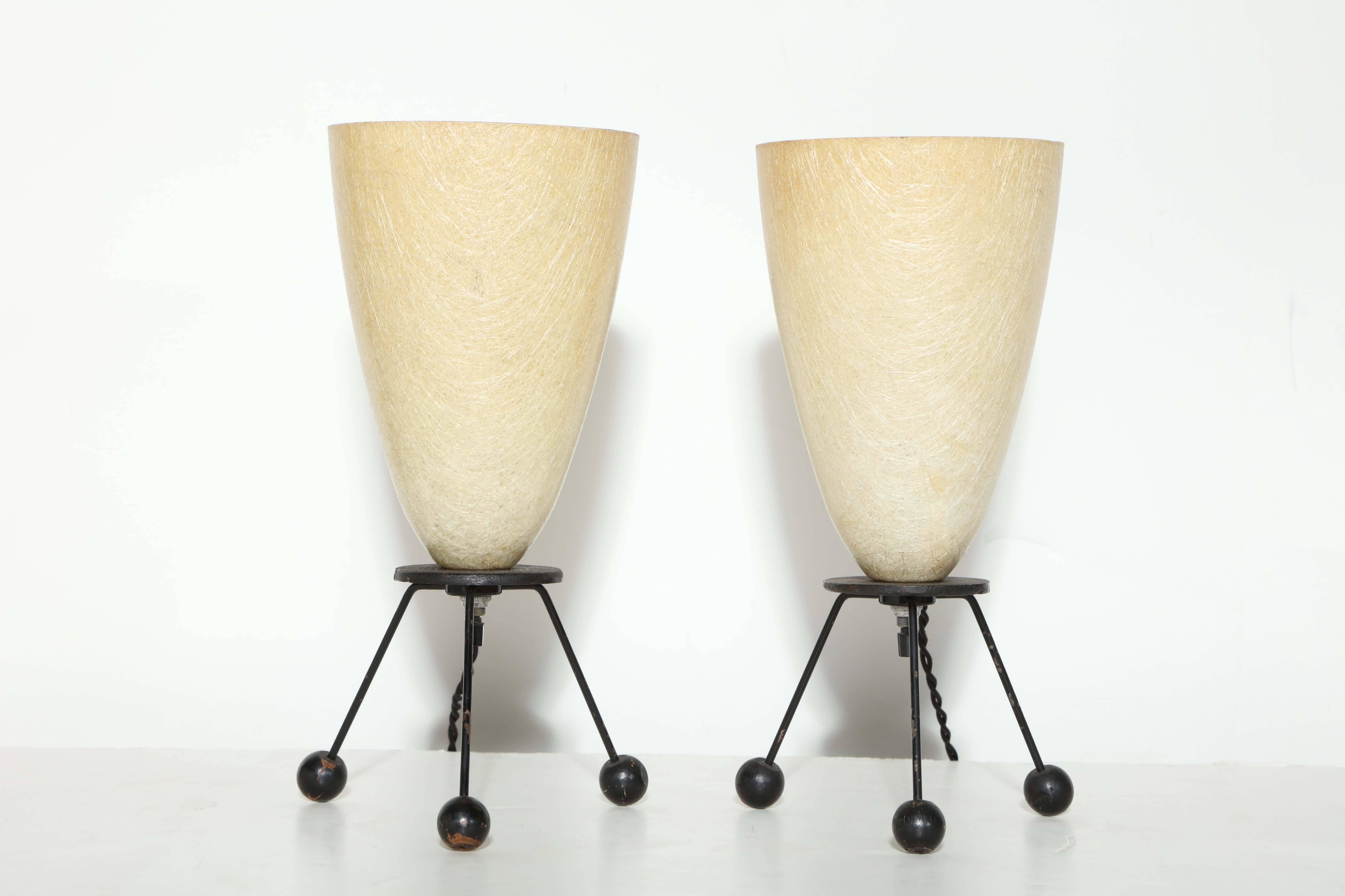 Smaller Pair Tripod Uplights, Sconces in Black Wire with Ball Feet and Cream Shades, 1950's, in the manner of Tony Paul.  Featuring articulating Pale Yellow Fiberglass bullet cone Shades, (shades articulate downward), round Black enameled metal