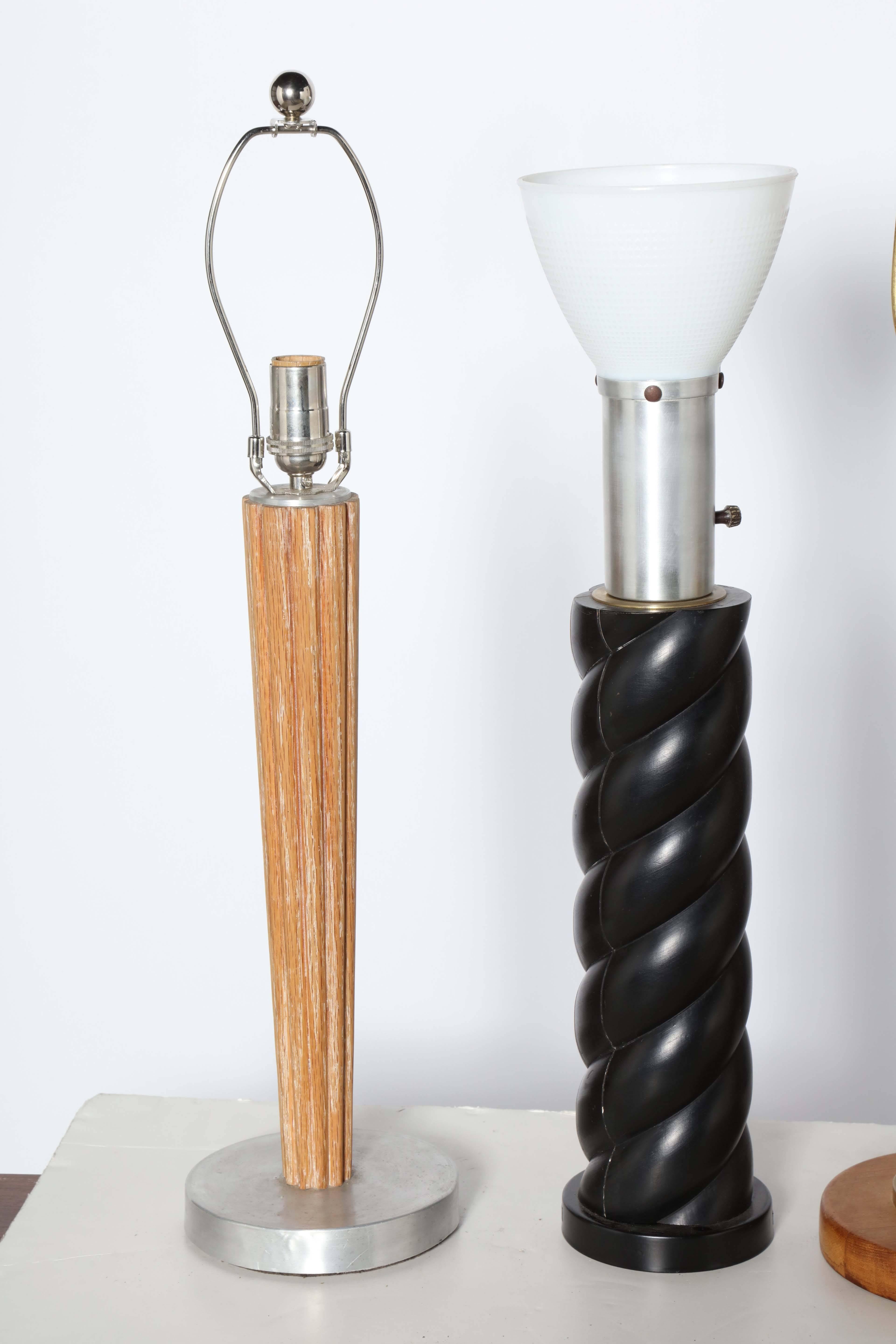 An array of Russel Wright Table Lamps produced from the 1930's-1950's in Wood, Aluminum, Brass and Glass are made in USA, rewired and available for $1750 each.  PLease see detailed descriptions below:
RIGHT: 1940s Machine Age Spun Aluminum and Glass