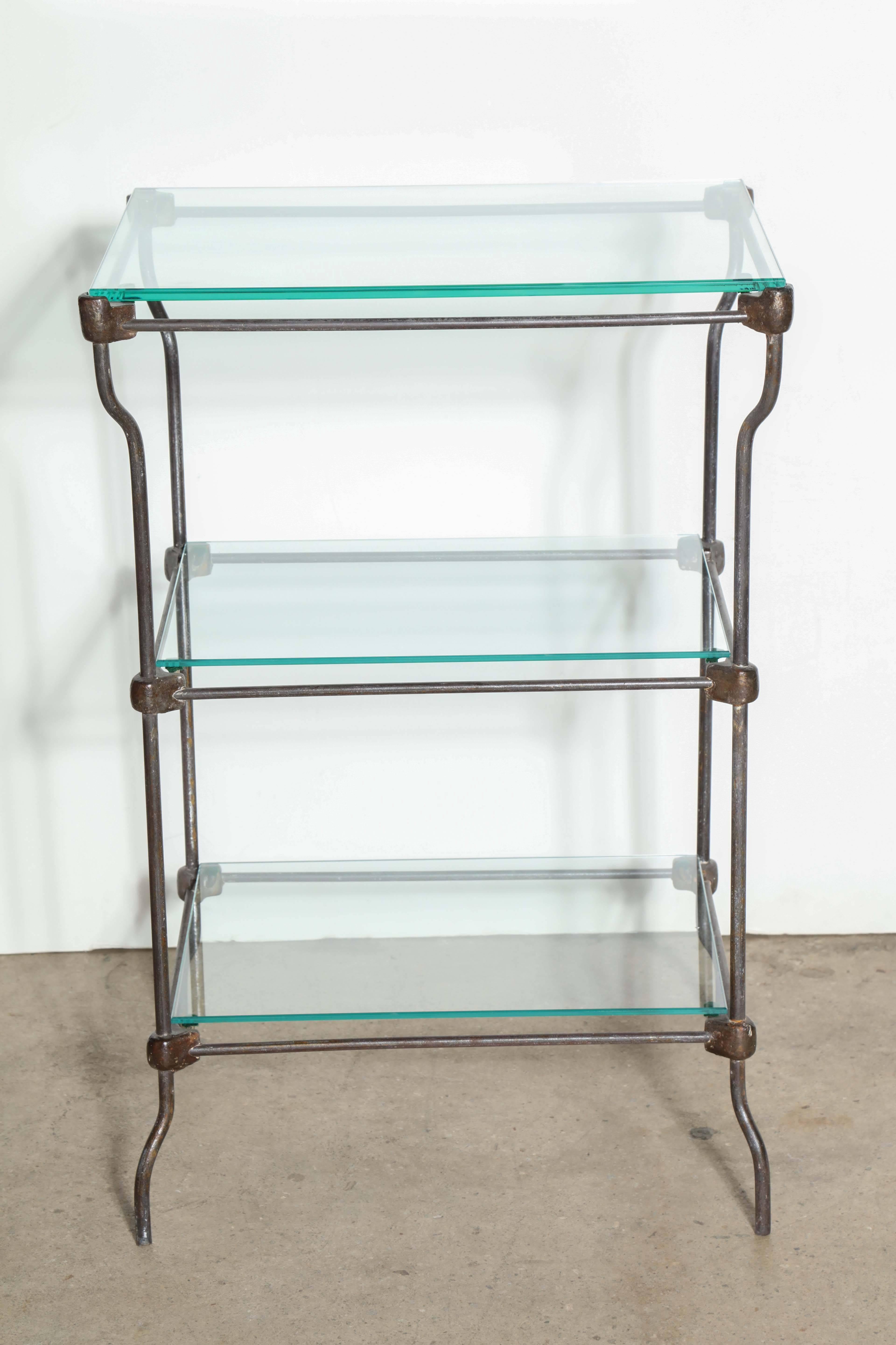 Circa 1890's Curved Iron and Glass Three Tier Etagere, Beverage Server, Serving Table, Dry Bar.  Featuring a detailed sturdy Steel framework, three levels with larger top shelf. Three new glass shelves. Cabriole legs. Industrial. Elegant. Versatile.